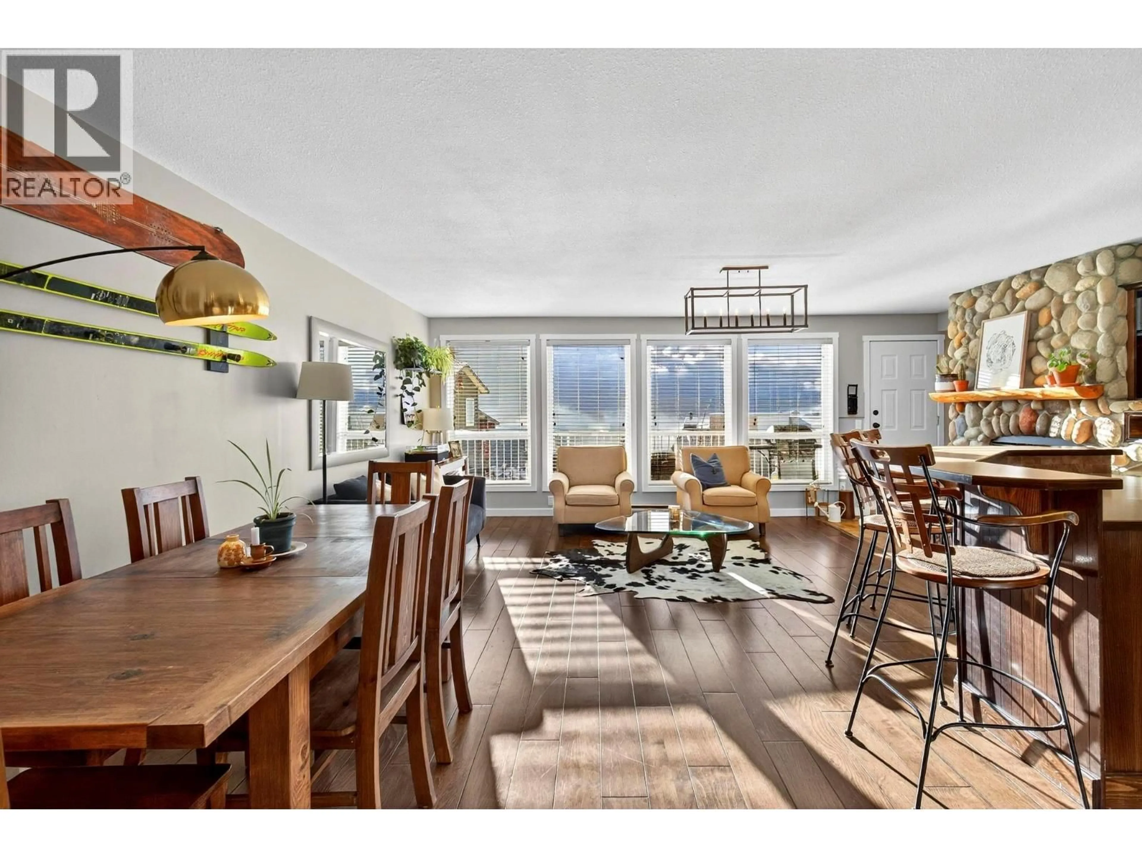 Open concept kitchen, wood/laminate floor for 104 - 7375 PORCUPINE ROAD, Big White British Columbia V1P1T4