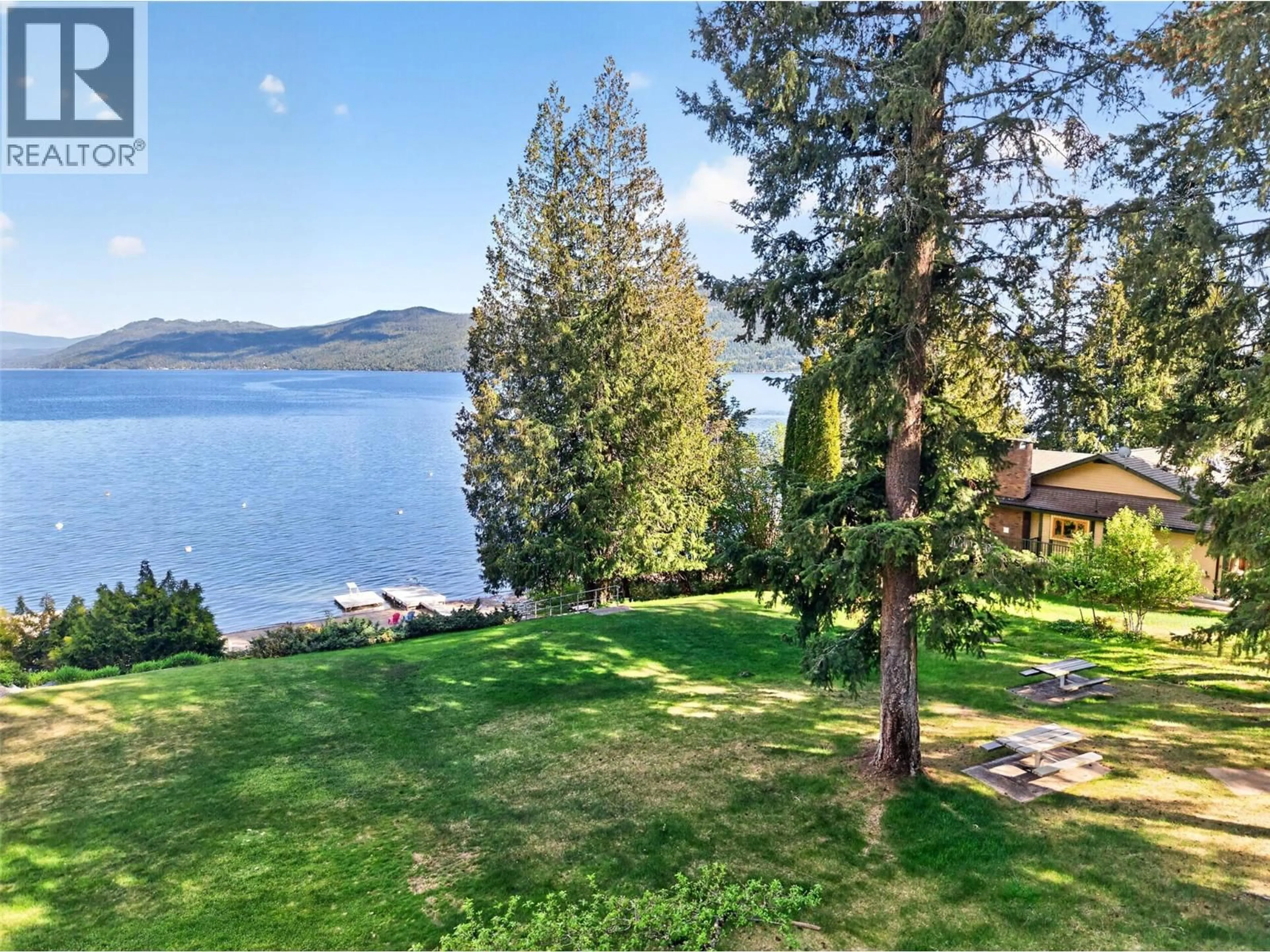 A pic from outside/outdoor area/front of a property/back of a property/a pic from drone, water/lake/river/ocean view for 22 - 4498 SQUILAX-ANGLEMONT ROAD, Scotch Creek British Columbia V0E1M5