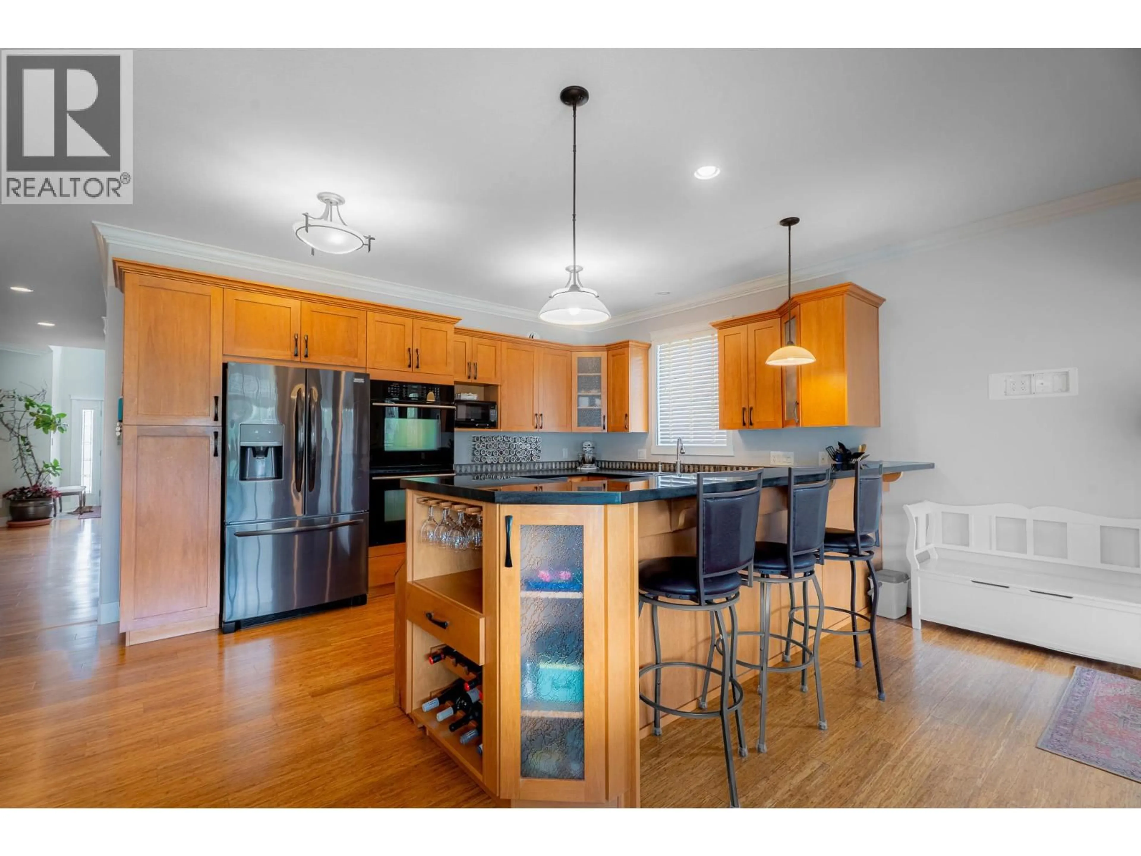 Open concept kitchen, wood/laminate floor for 545 KOBAYASHI PLACE, Kamloops British Columbia V2B0B5