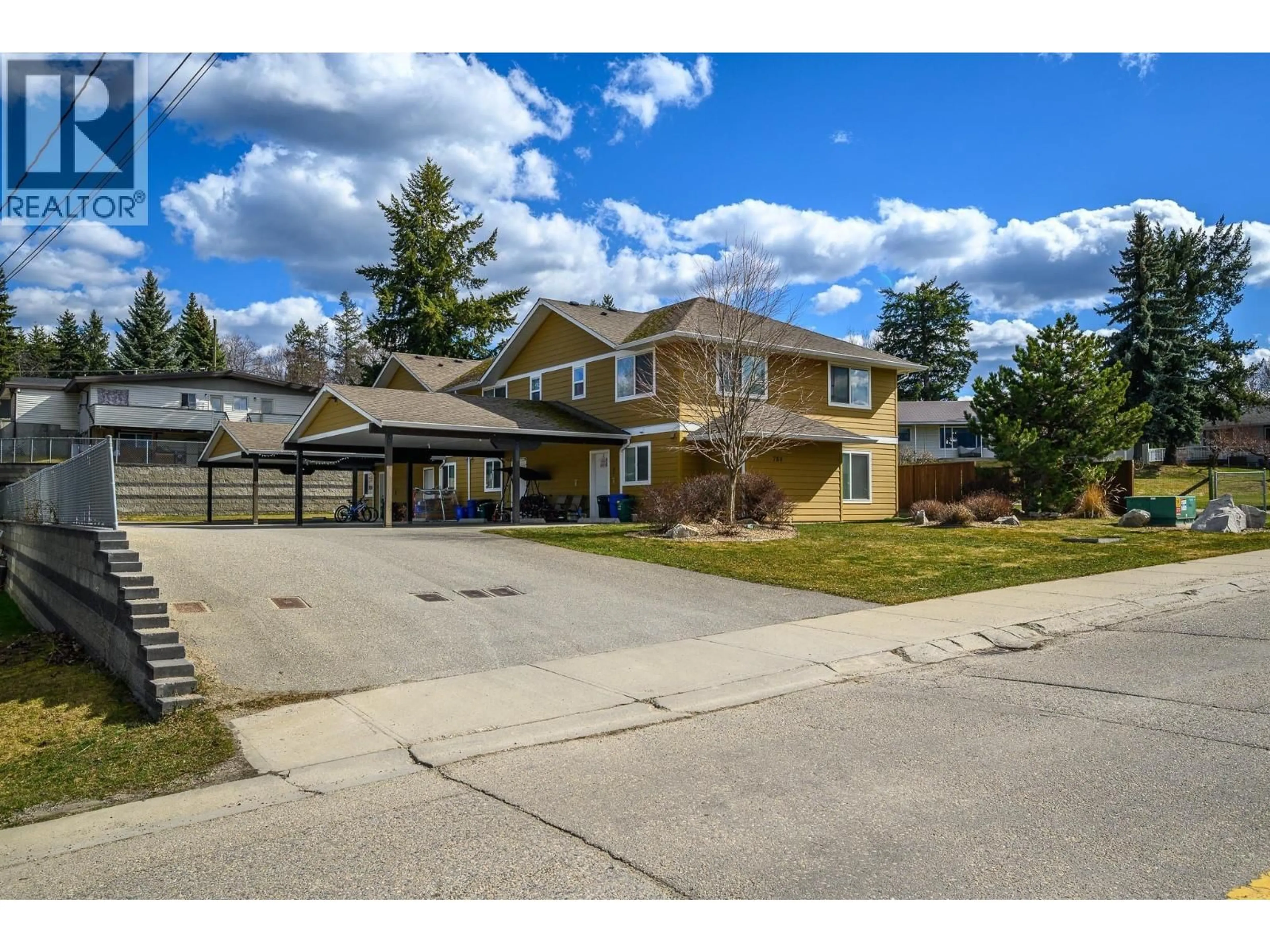 A pic from outside/outdoor area/front of a property/back of a property/a pic from drone, street for 1-4 - 780 20 STREET NORTHEAST, Salmon Arm British Columbia V1E2K9