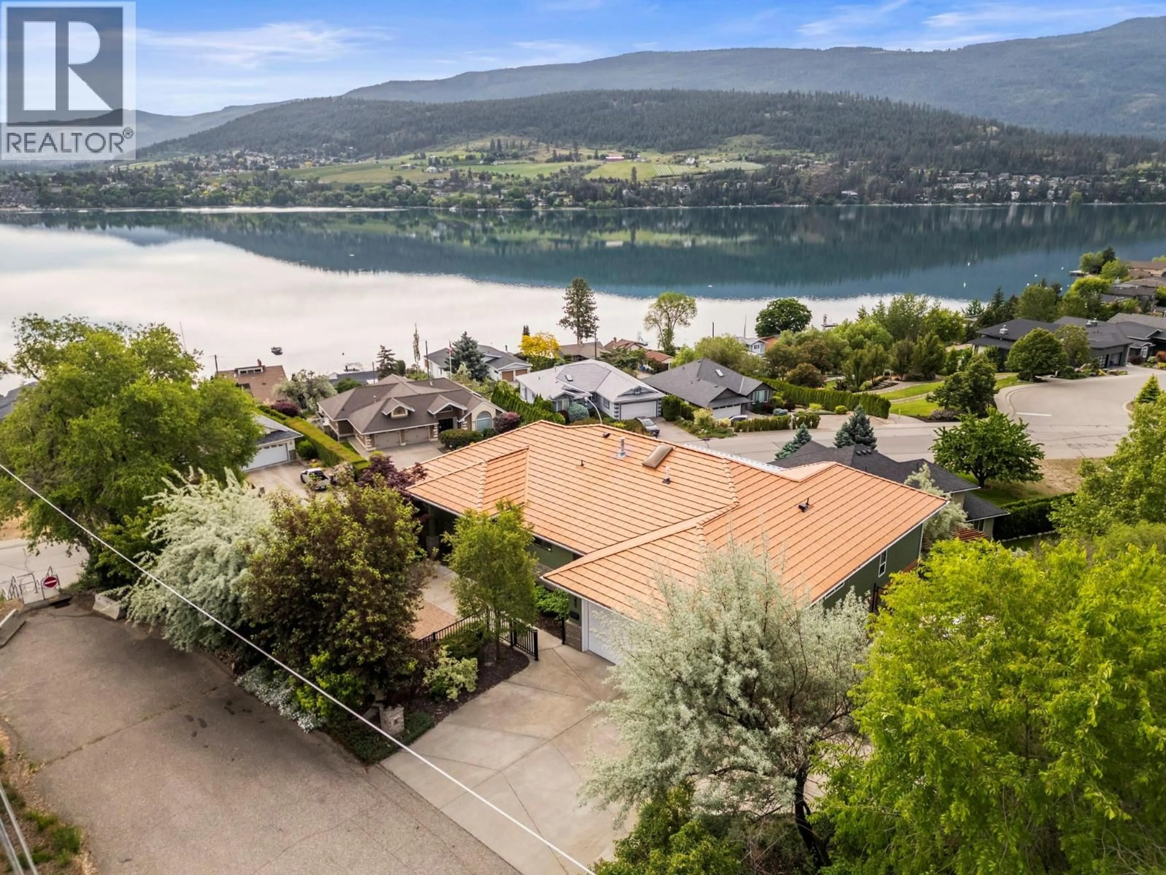 A pic from outside/outdoor area/front of a property/back of a property/a pic from drone, water/lake/river/ocean view for 13706 WATSON DRIVE, Coldstream British Columbia V1B0A4
