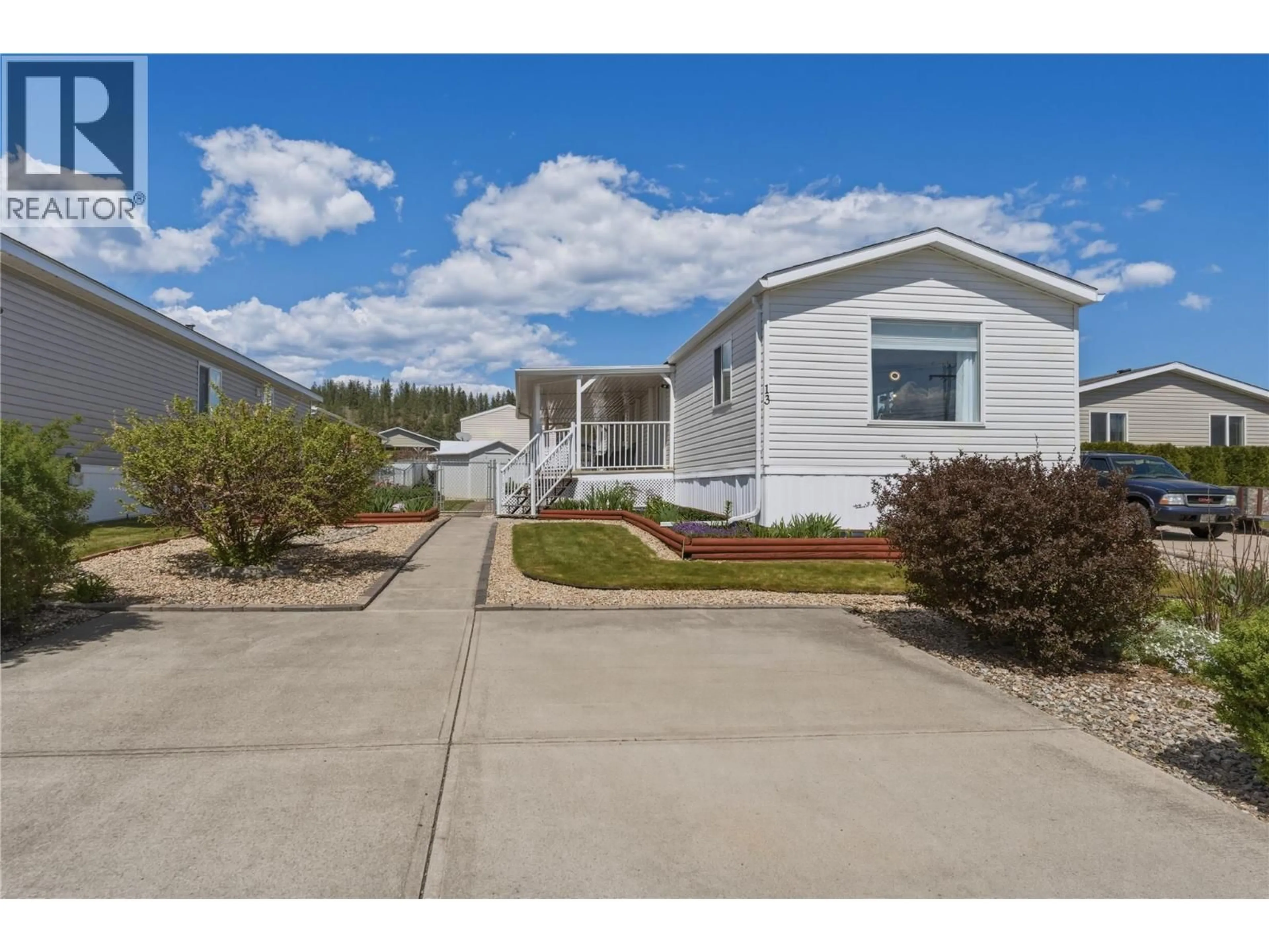Home with vinyl exterior material, street for 13 - 12560 WESTSIDE ROAD, Vernon British Columbia V1H1S9