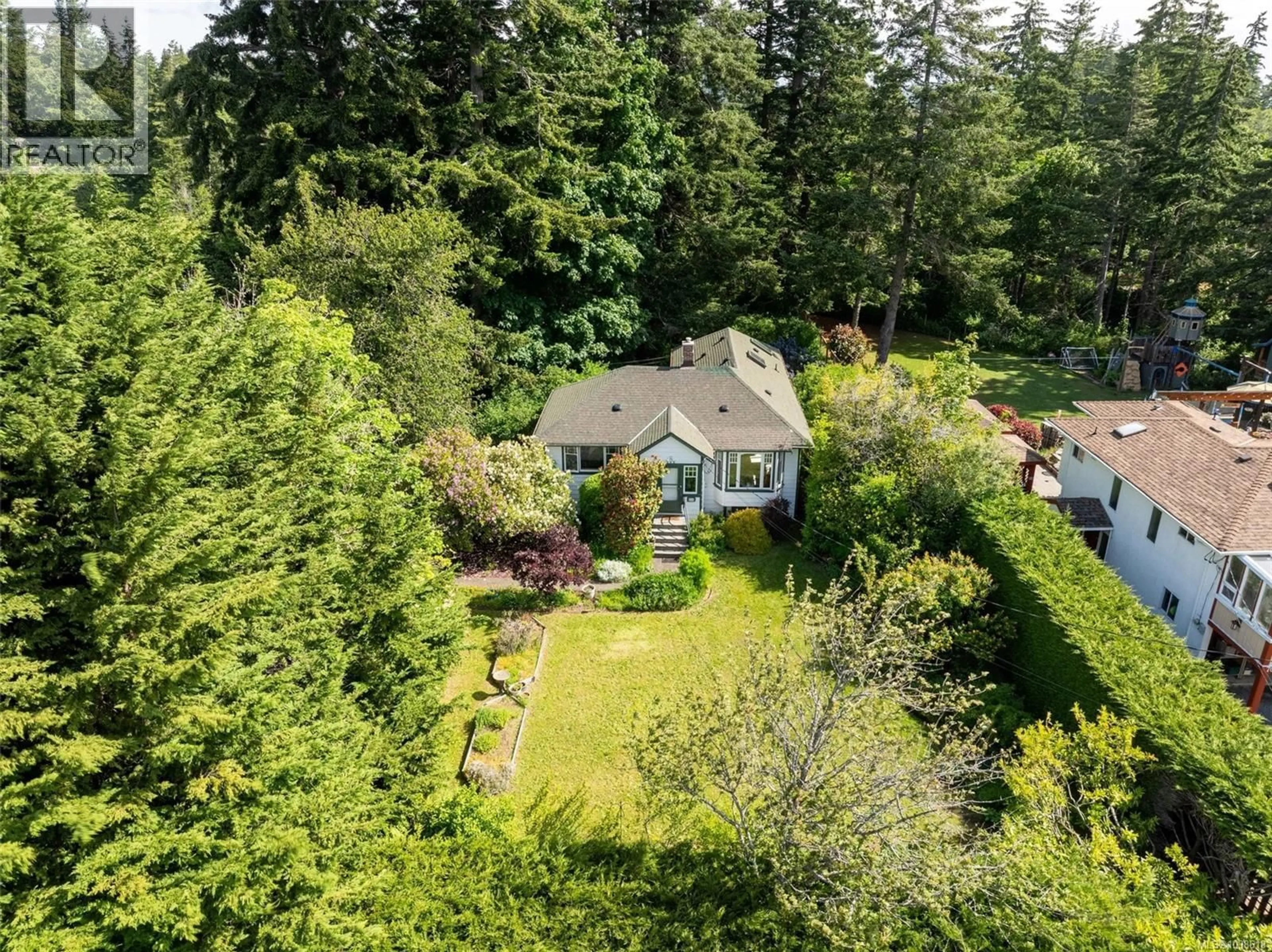 A pic from outside/outdoor area/front of a property/back of a property/a pic from drone, forest/trees view for 713 KANGAROO ROAD, Metchosin British Columbia V9C4E2