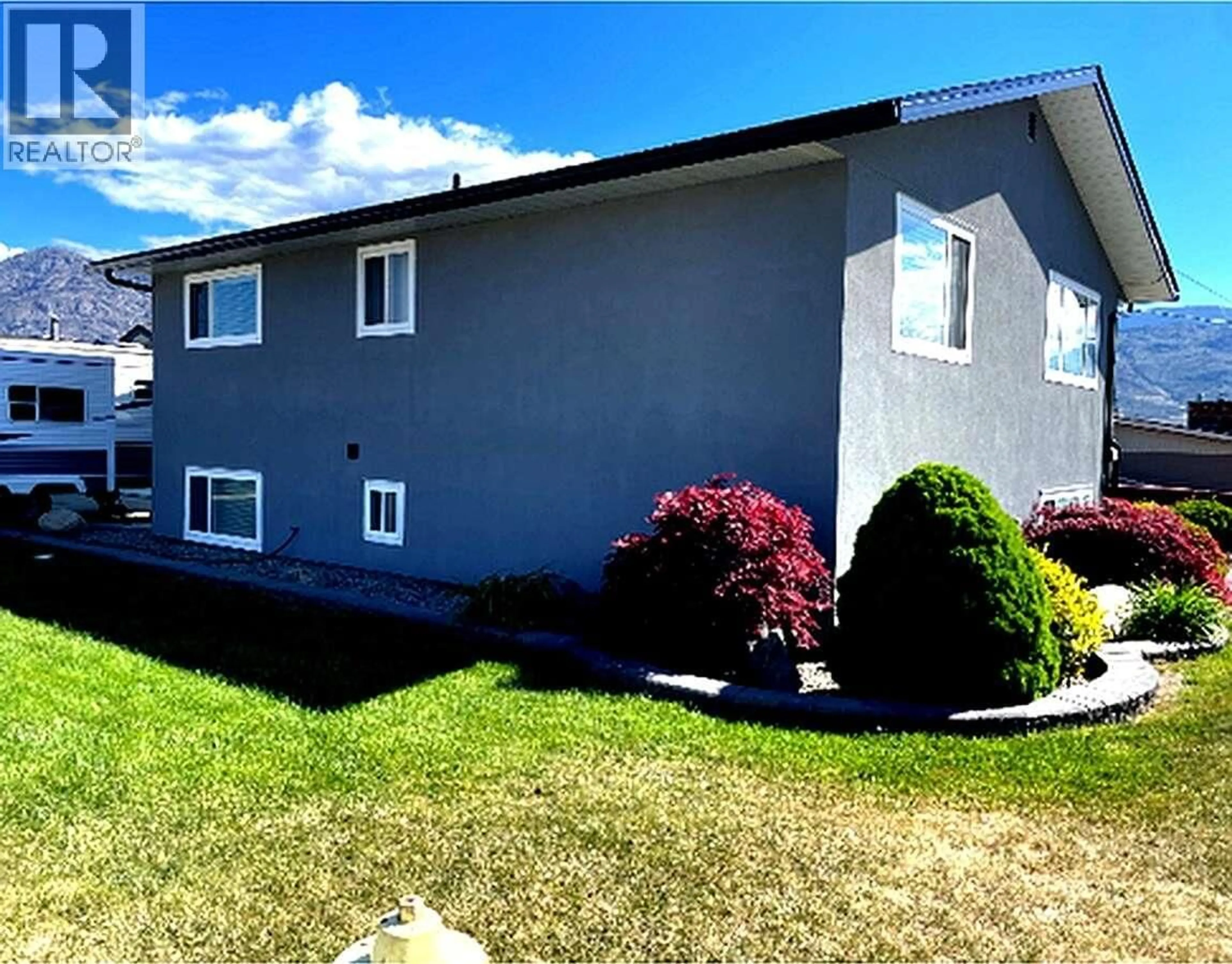 Home with vinyl exterior material, unknown for 9106 HUMMINGBIRD LANE, Osoyoos British Columbia V0H1V5