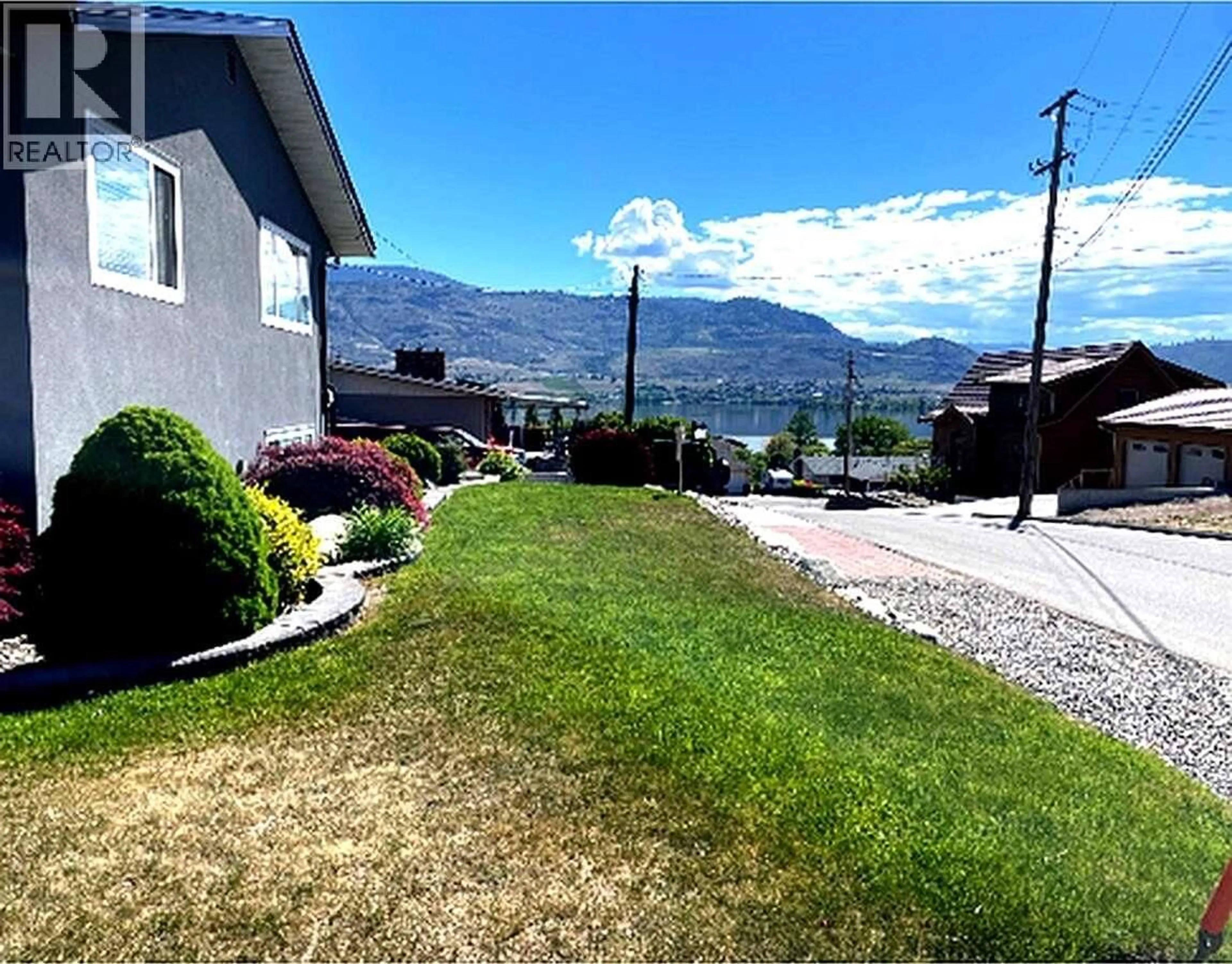 A pic from outside/outdoor area/front of a property/back of a property/a pic from drone, mountain view for 9106 HUMMINGBIRD LANE, Osoyoos British Columbia V0H1V5