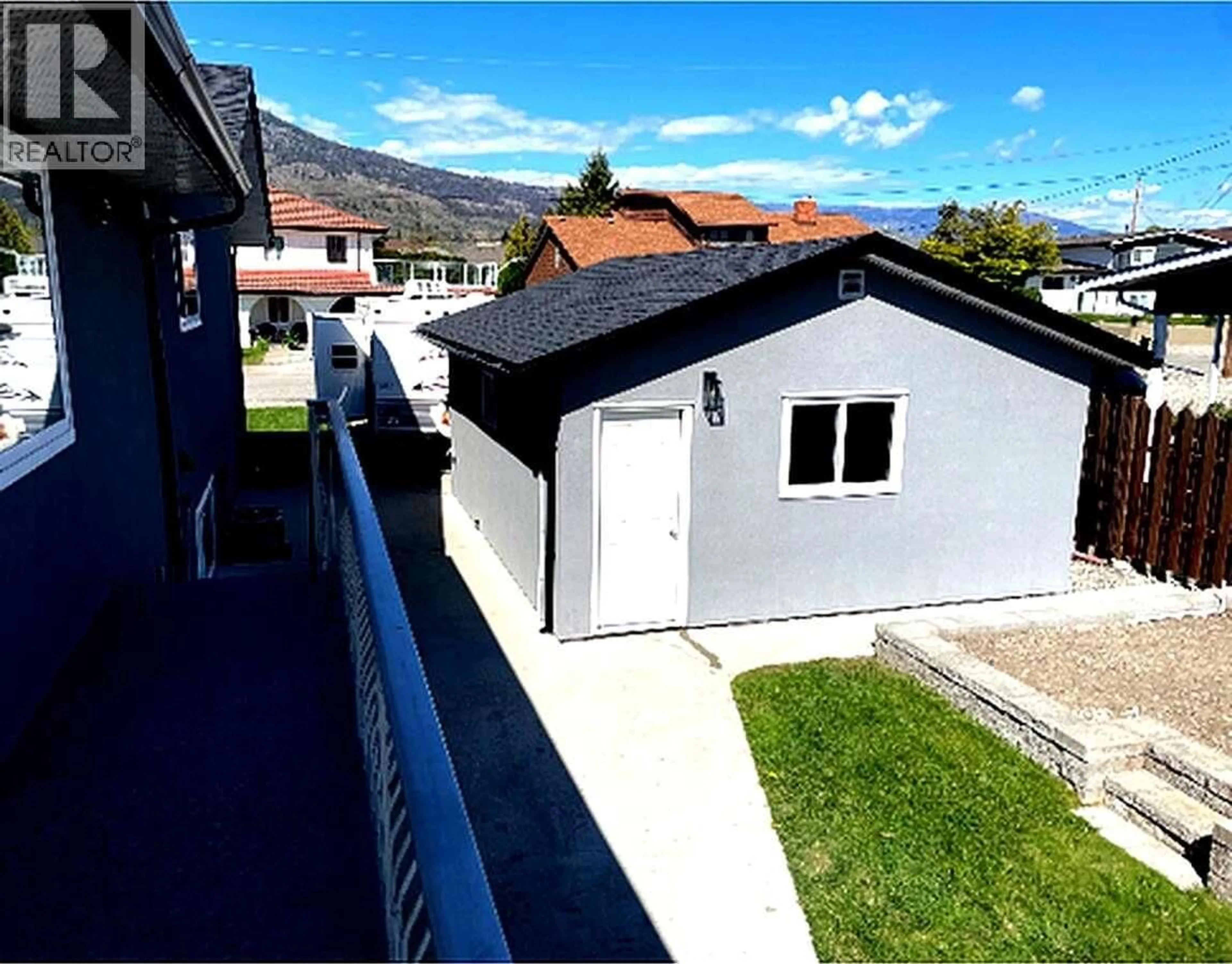 A pic from outside/outdoor area/front of a property/back of a property/a pic from drone, mountain view for 9106 HUMMINGBIRD LANE, Osoyoos British Columbia V0H1V5