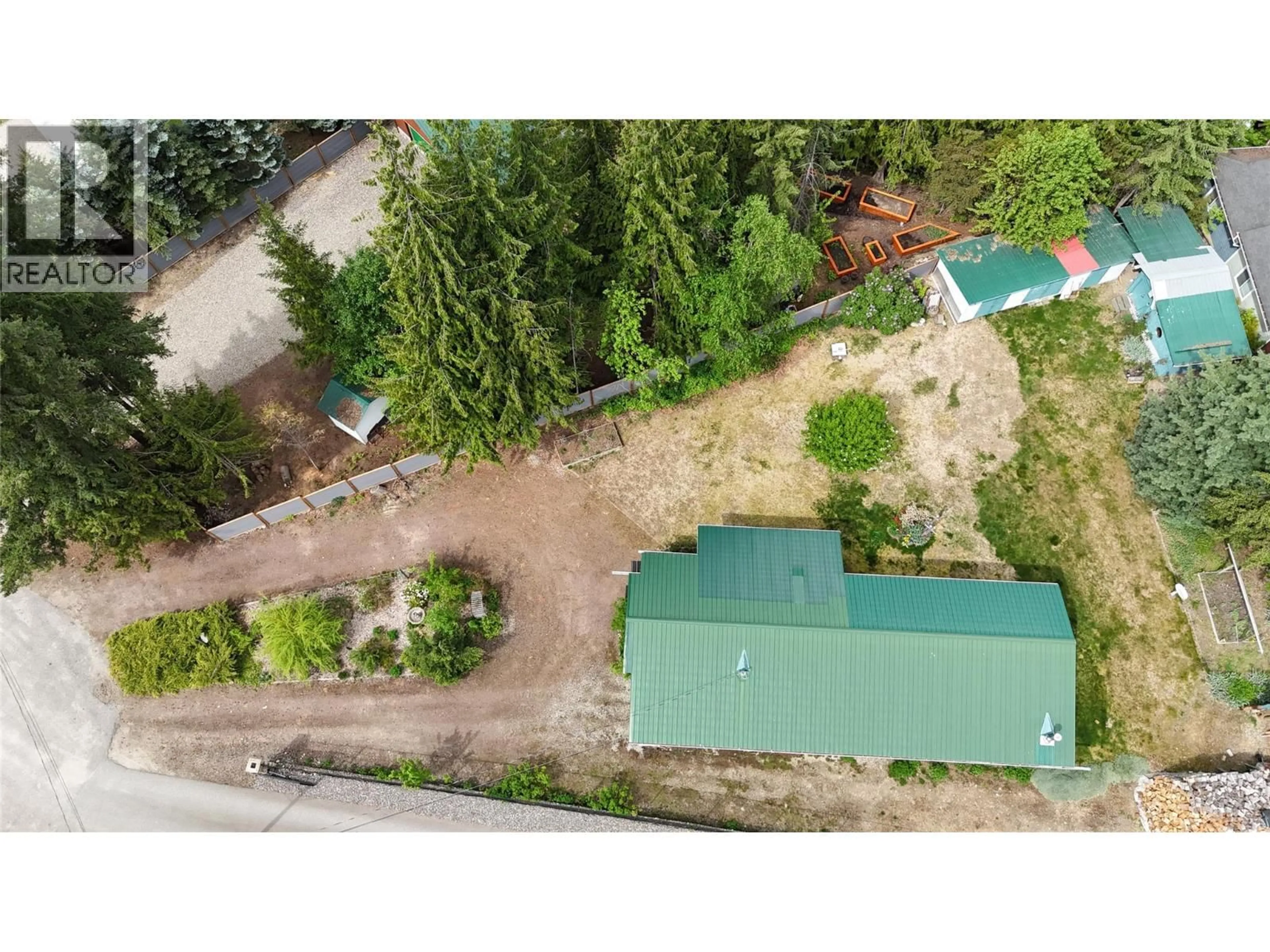 A pic from outside/outdoor area/front of a property/back of a property/a pic from drone, forest/trees view for 627 SWANSON PLACE, Swansea Point British Columbia V0E2K2