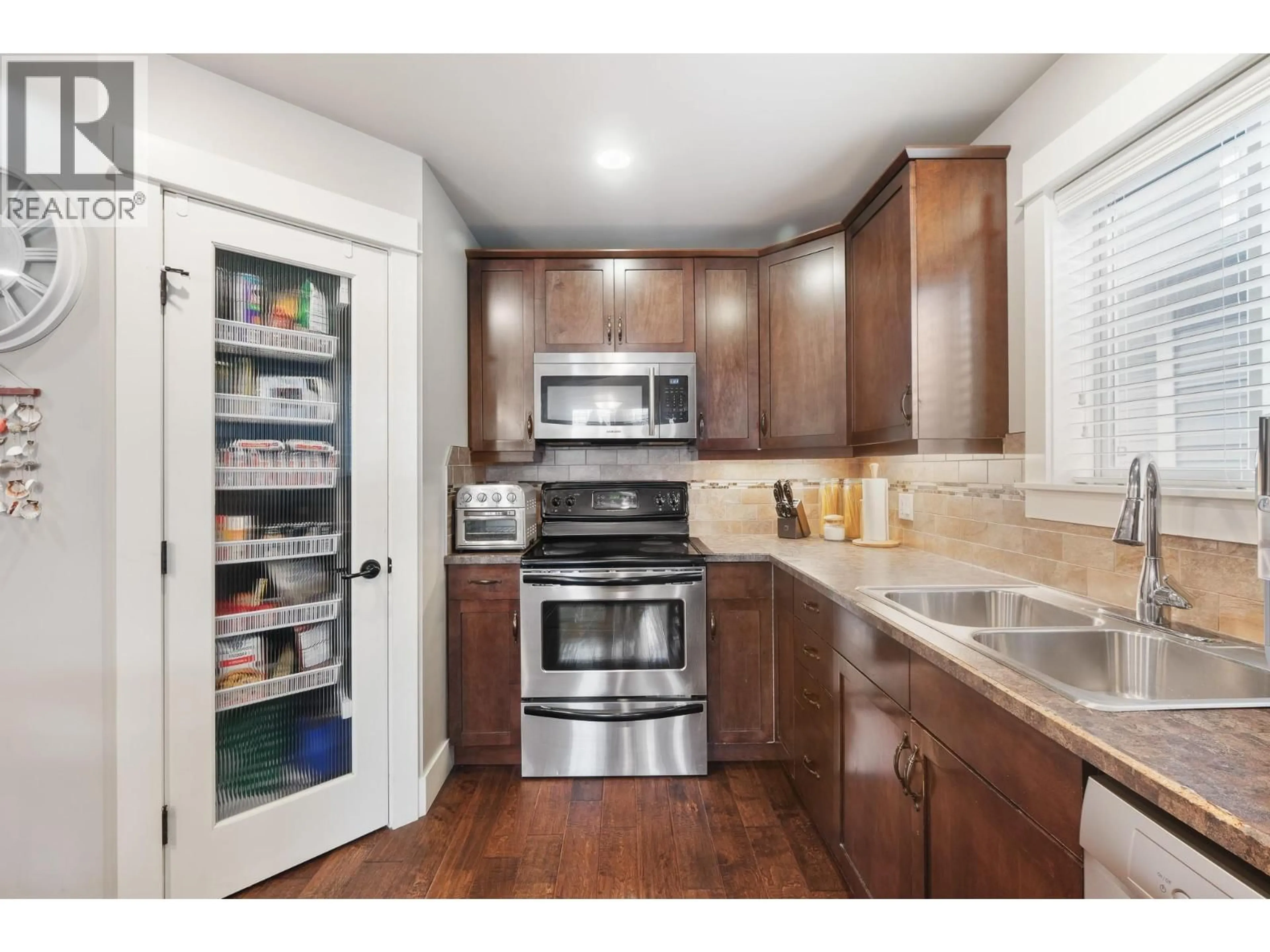 Standard kitchen, wood/laminate floor for 8 - 6635 TRONSON ROAD, Vernon British Columbia V1H2K4
