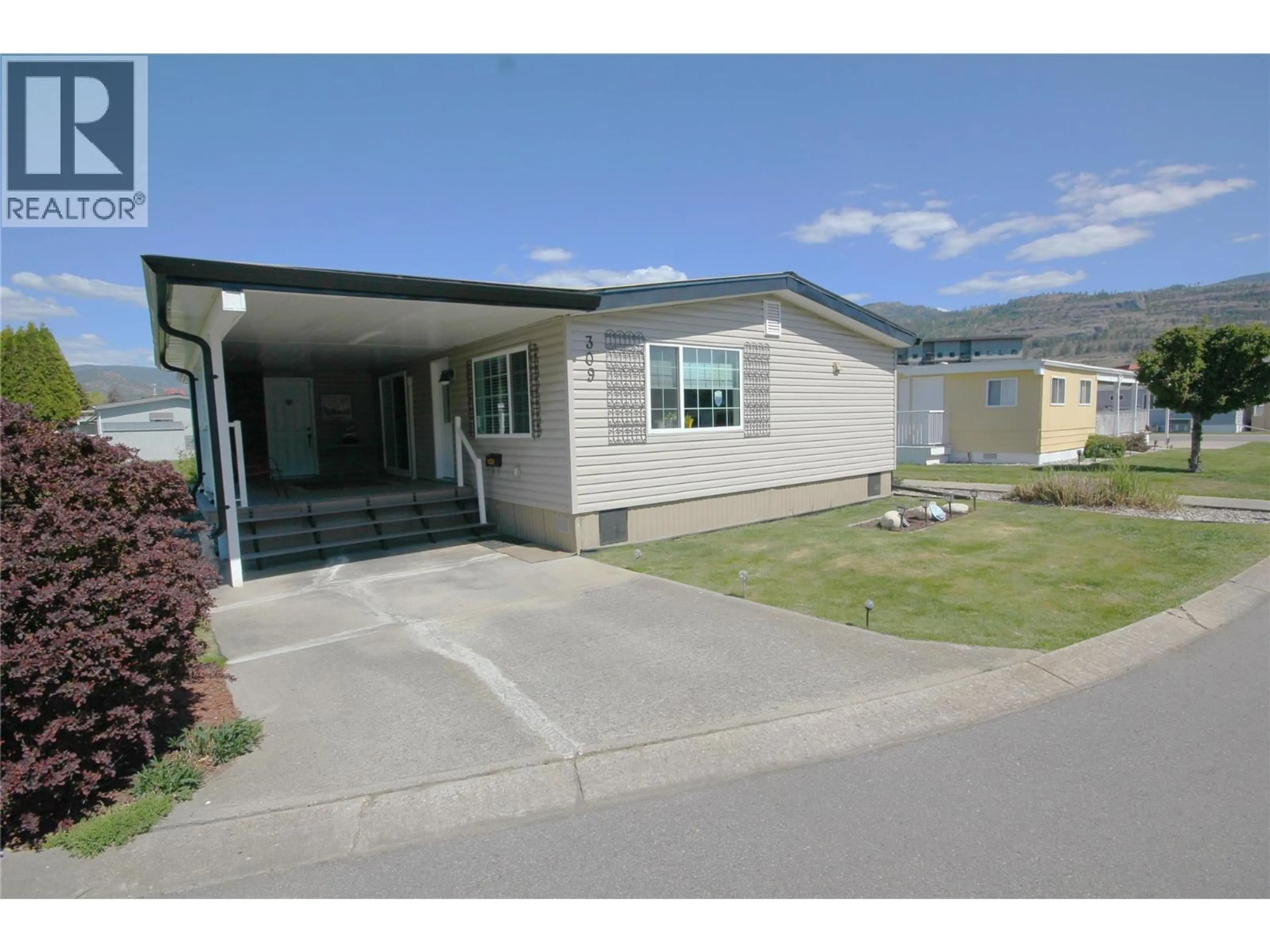 Home with vinyl exterior material, mountain view for 309 - 321 YORKTON AVENUE, Penticton British Columbia V2A3V6