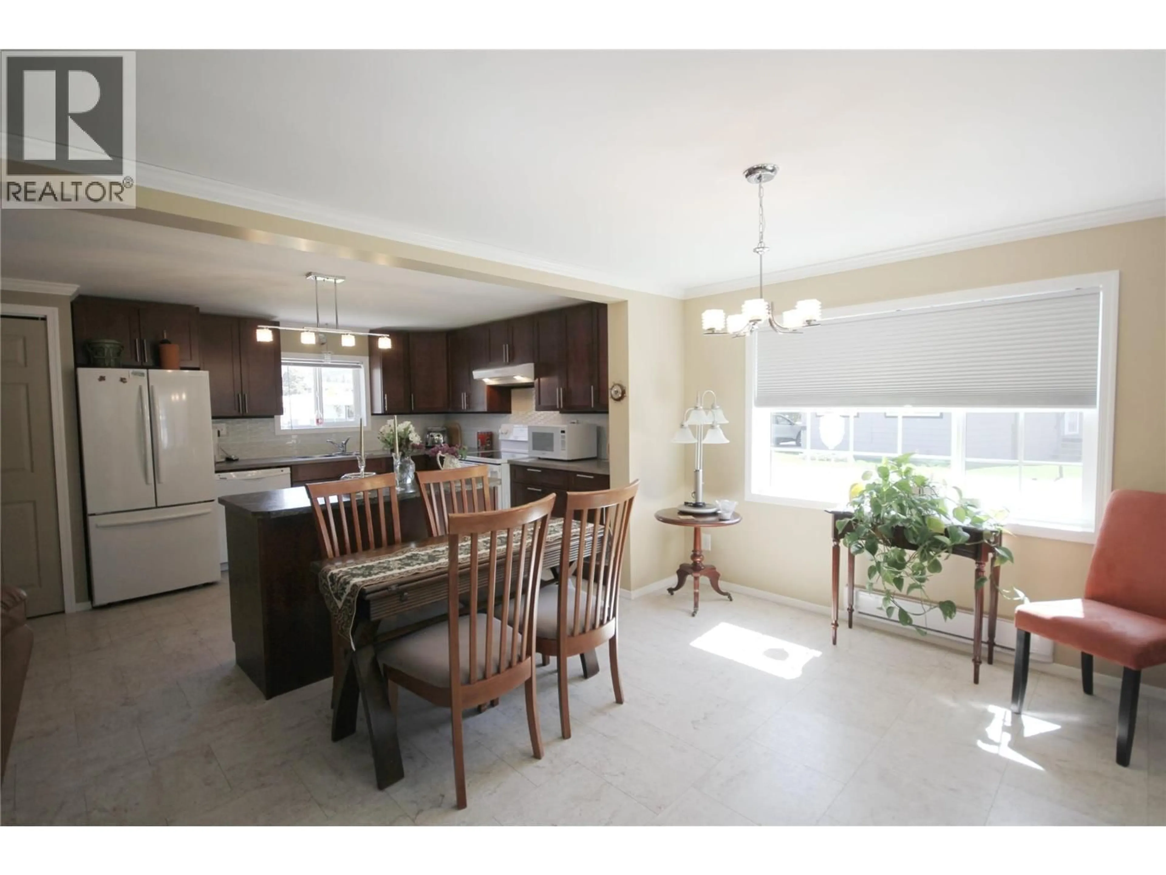 Open concept kitchen, ceramic/tile floor for 309 - 321 YORKTON AVENUE, Penticton British Columbia V2A3V6