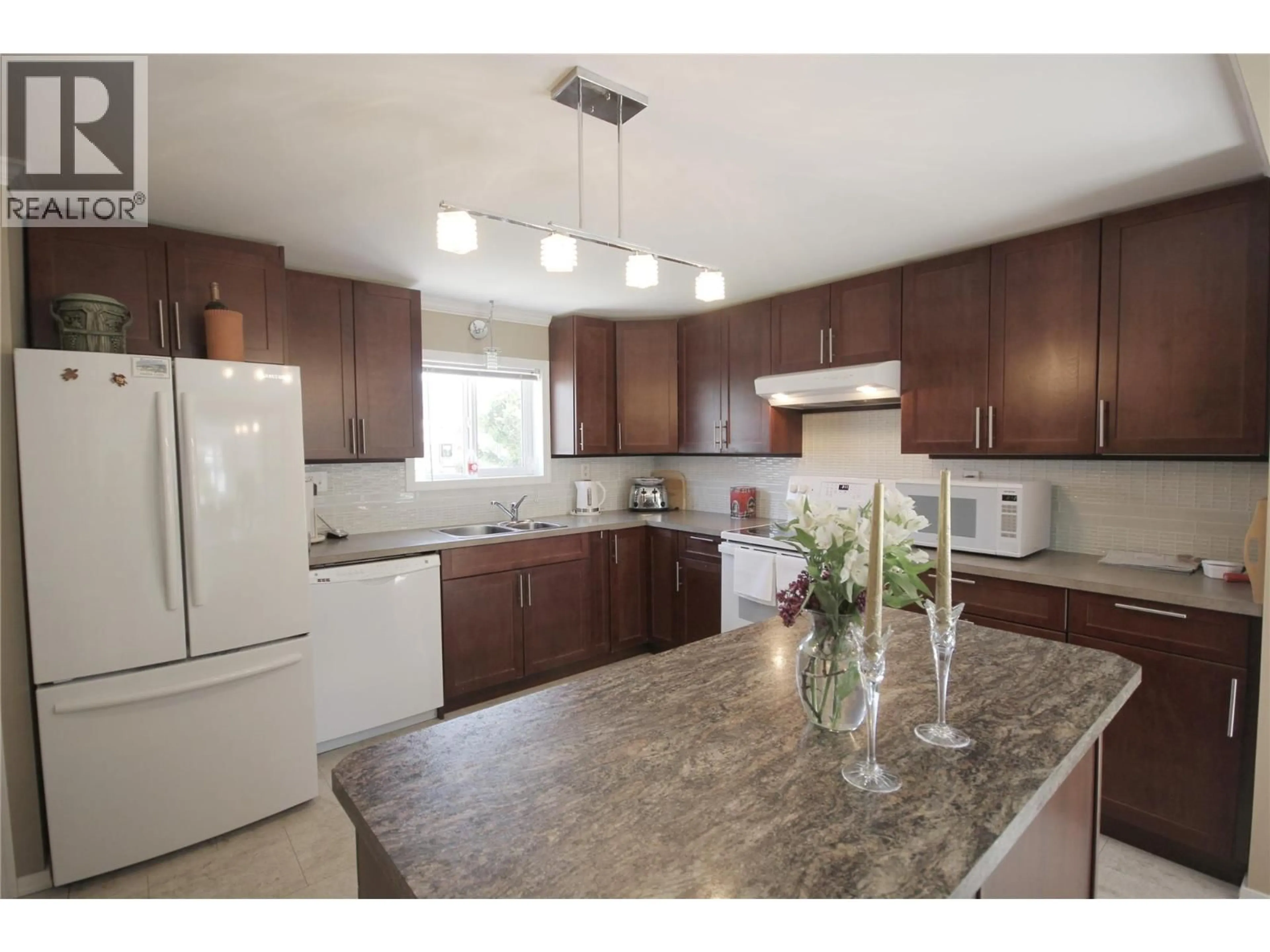 Open concept kitchen, unknown for 309 - 321 YORKTON AVENUE, Penticton British Columbia V2A3V6