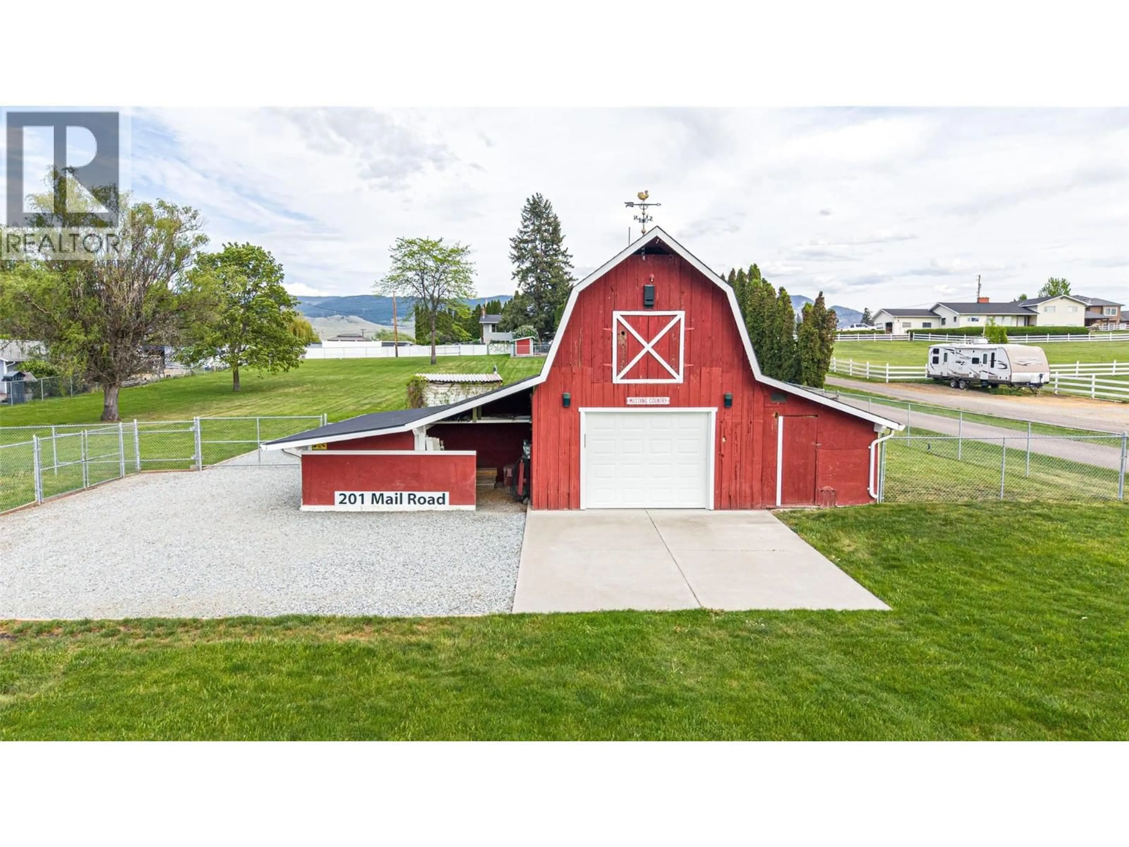 A pic from outside/outdoor area/front of a property/back of a property/a pic from drone, building for 201 MAIL ROAD, Kelowna British Columbia V1V2G6