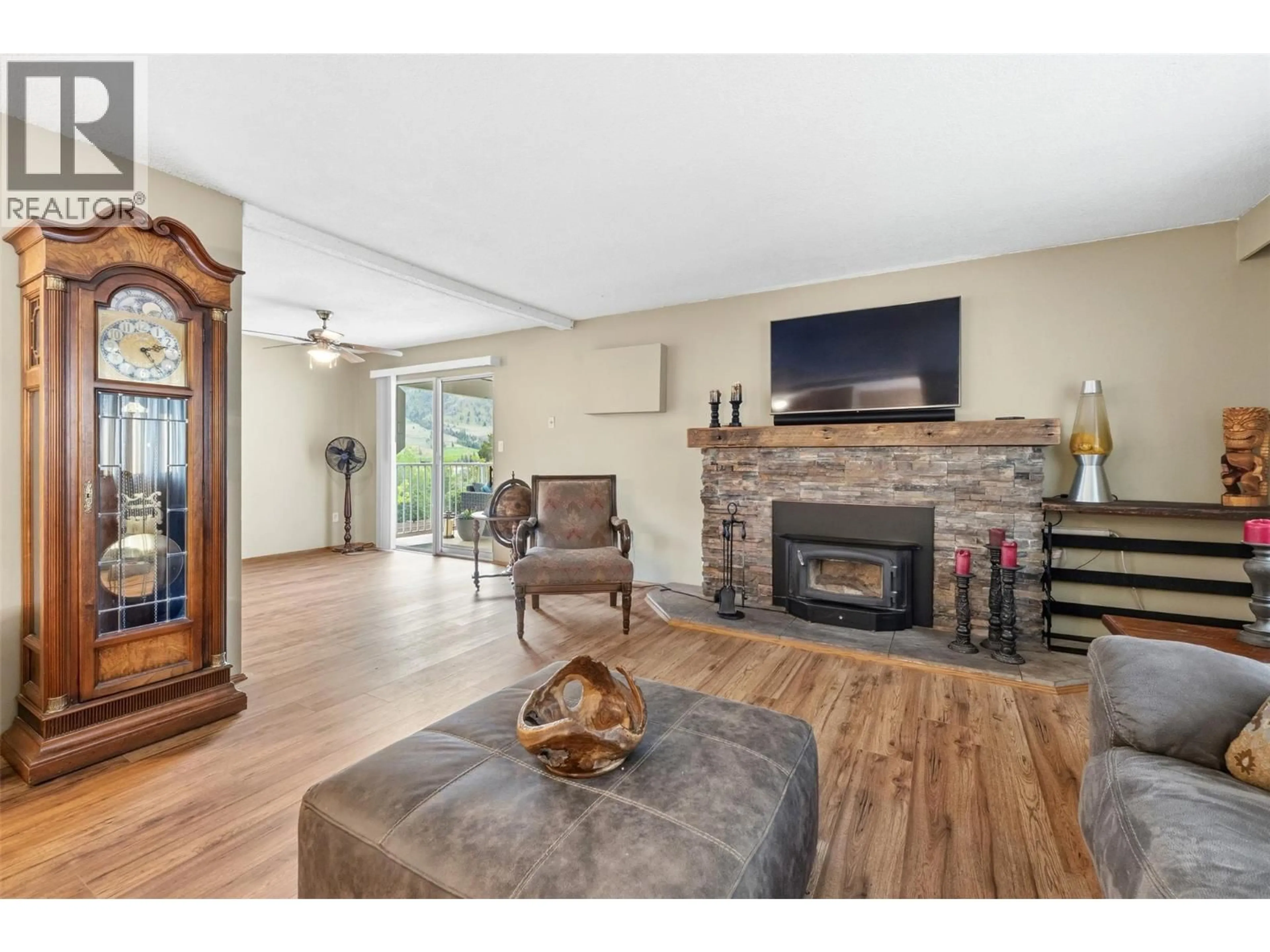 Living room with furniture, wood/laminate floor for 617 3RD AVENUE, Keremeos British Columbia V0X1N2