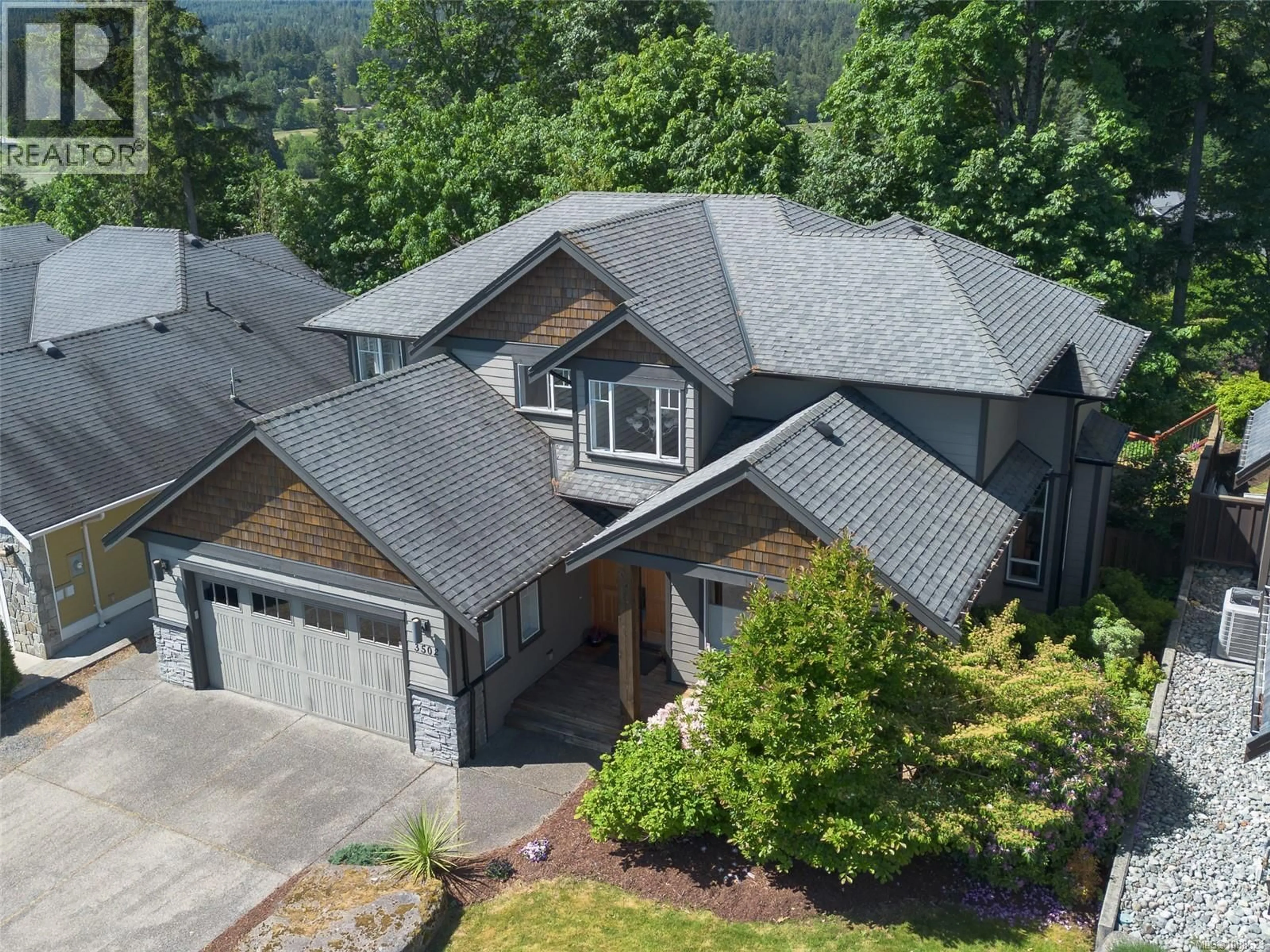A pic from outside/outdoor area/front of a property/back of a property/a pic from drone, mountain view for 3502 CASTLE ROCK DRIVE, Nanaimo British Columbia V9T0A6