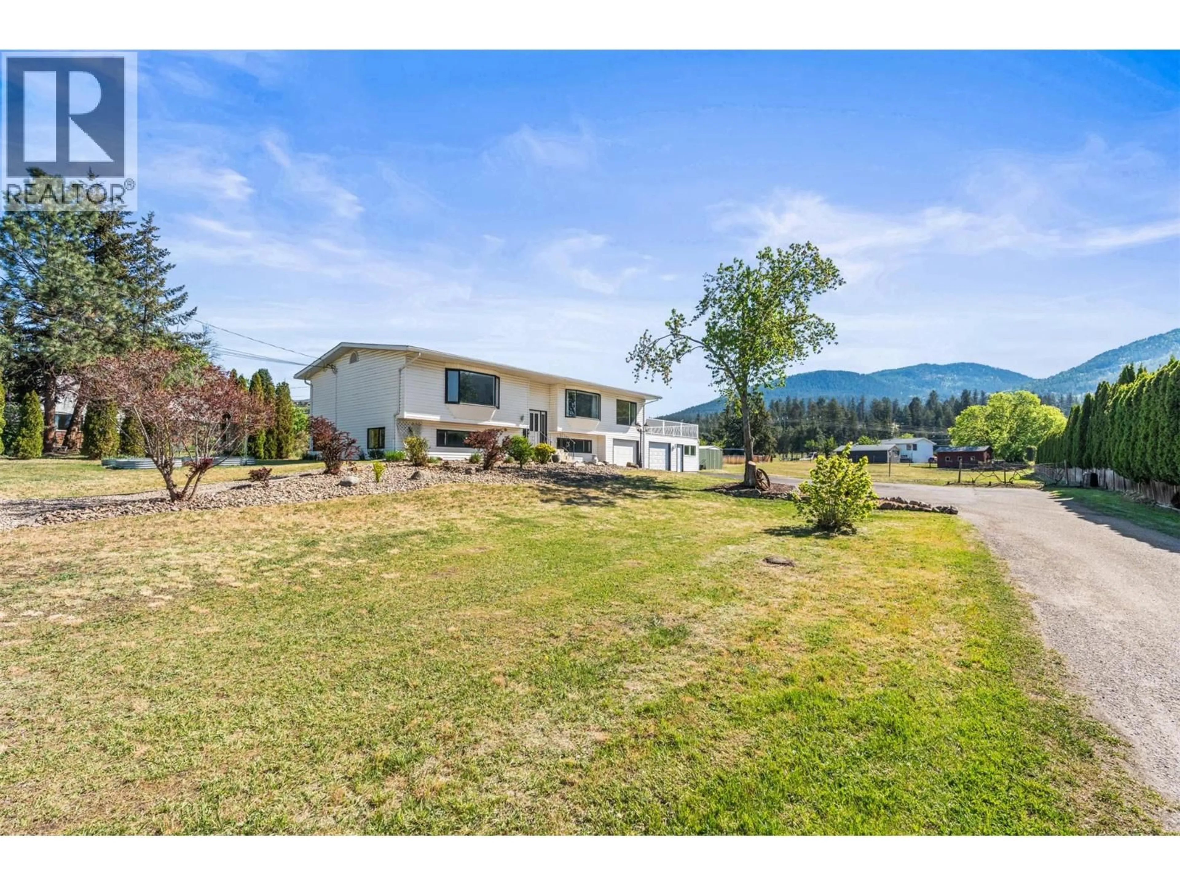 A pic from outside/outdoor area/front of a property/back of a property/a pic from drone, mountain view for 6109 SILVER STAR ROAD, Vernon British Columbia V1B3P3