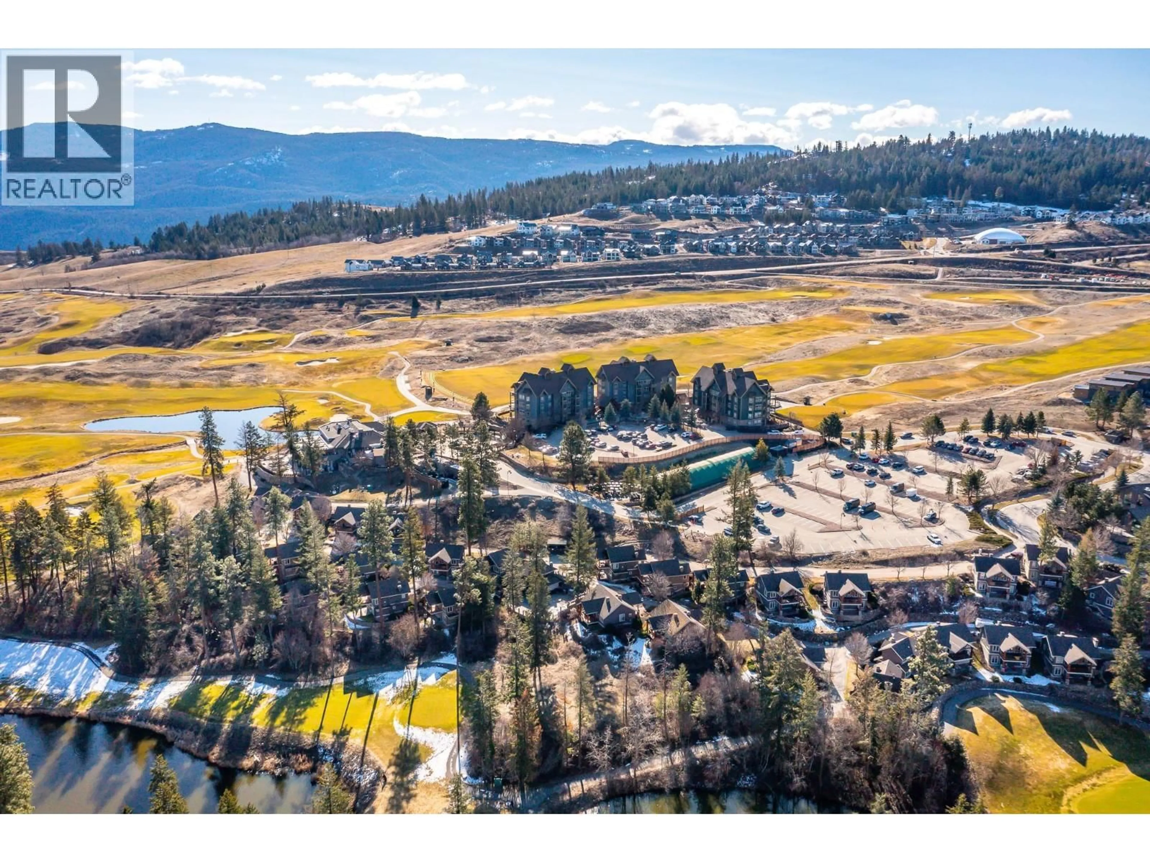 A pic from outside/outdoor area/front of a property/back of a property/a pic from drone, mountain view for 126 - 105 VILLAGE CENTRE COURT, Vernon British Columbia V1H1Y8