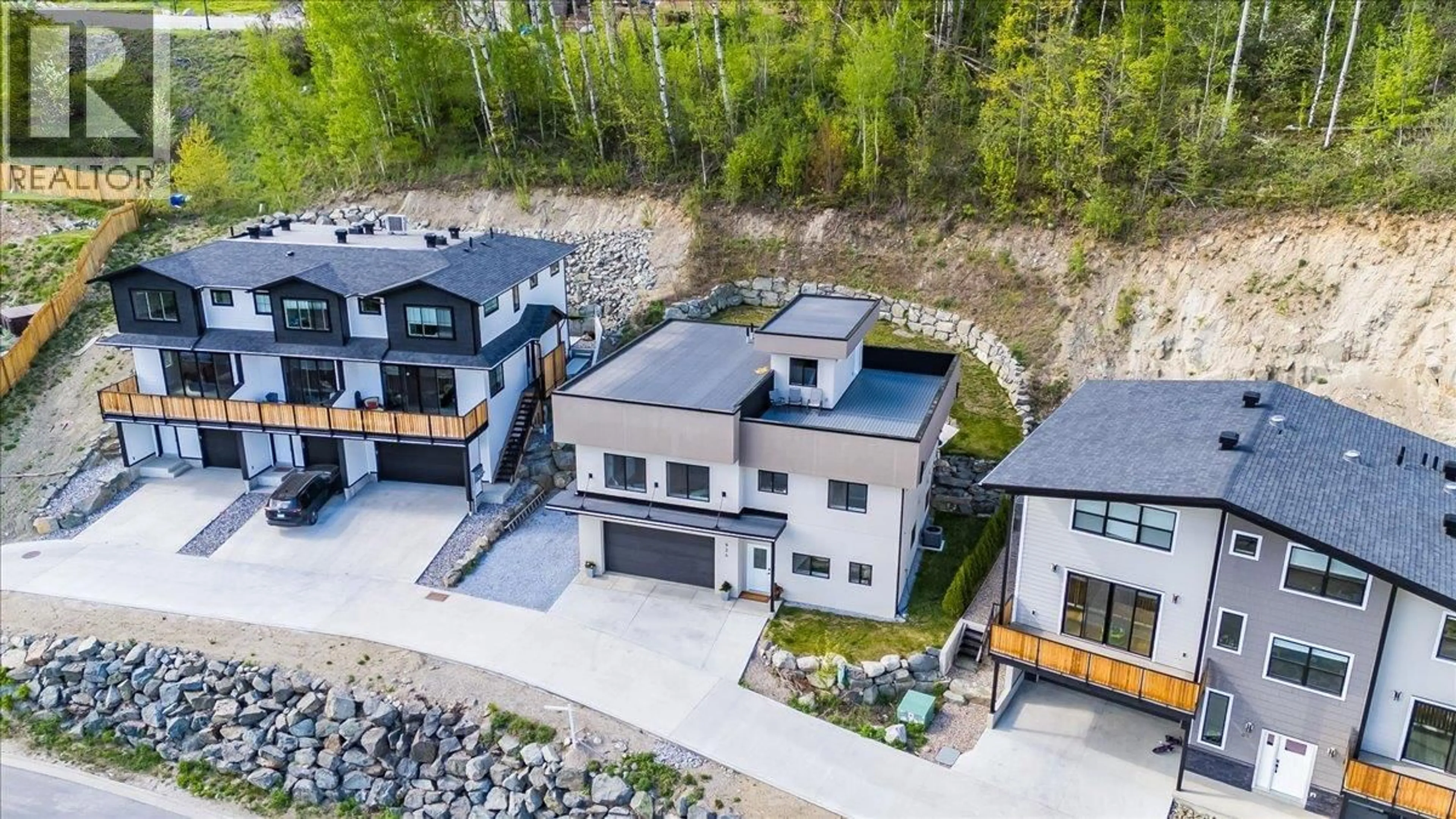 A pic from outside/outdoor area/front of a property/back of a property/a pic from drone, mountain view for 934 REDSTONE DRIVE, Rossland British Columbia V0G1Y0