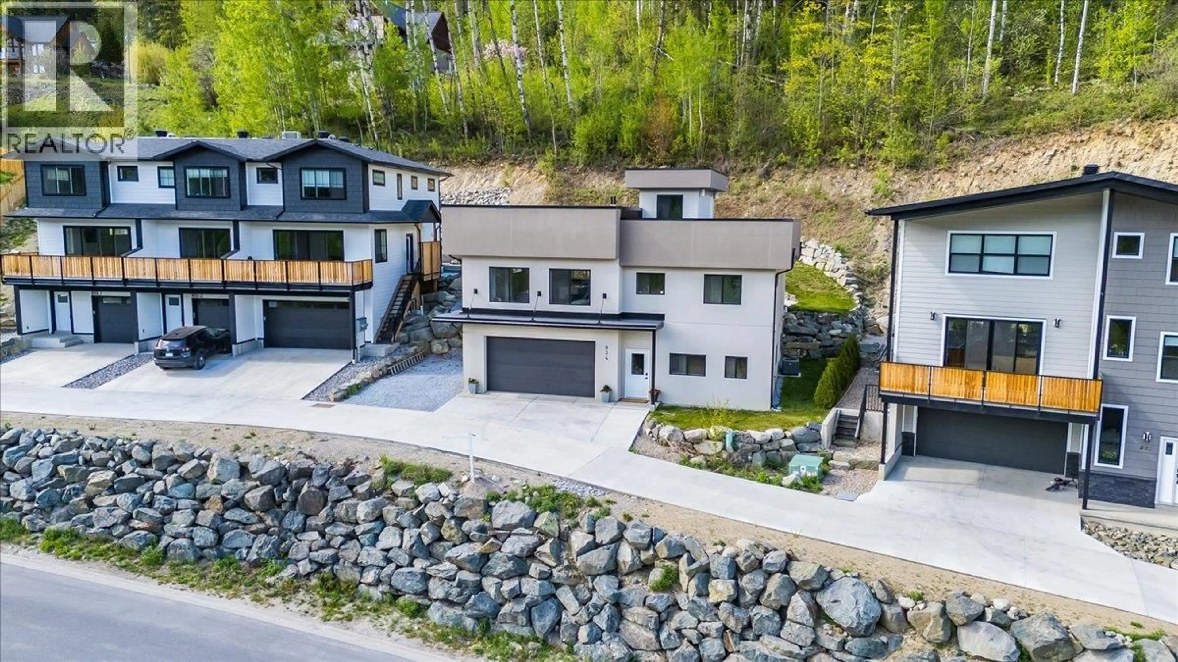 A pic from outside/outdoor area/front of a property/back of a property/a pic from drone, street for 934 REDSTONE DRIVE, Rossland British Columbia V0G1Y0