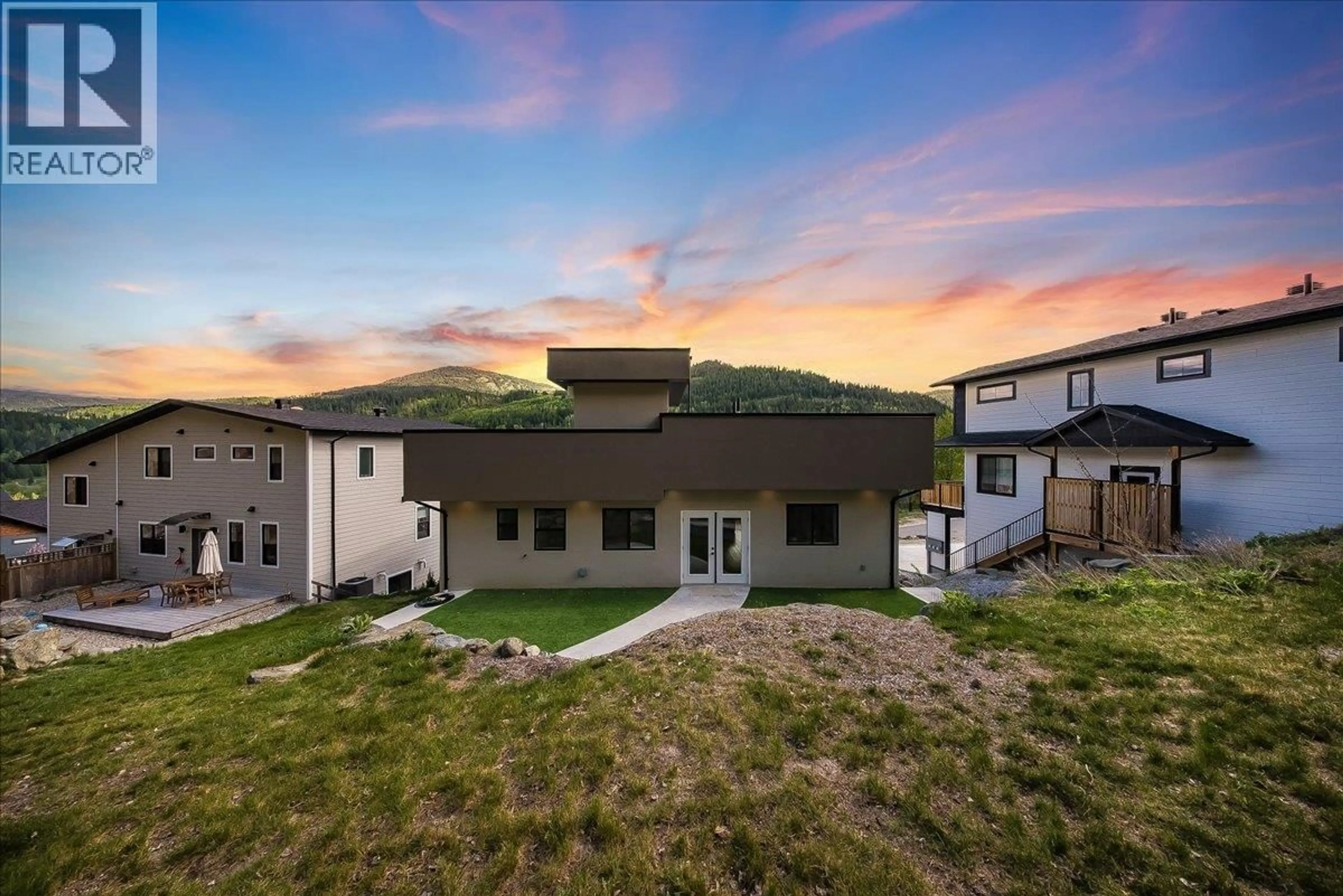 A pic from outside/outdoor area/front of a property/back of a property/a pic from drone, mountain view for 934 REDSTONE DRIVE, Rossland British Columbia V0G1Y0