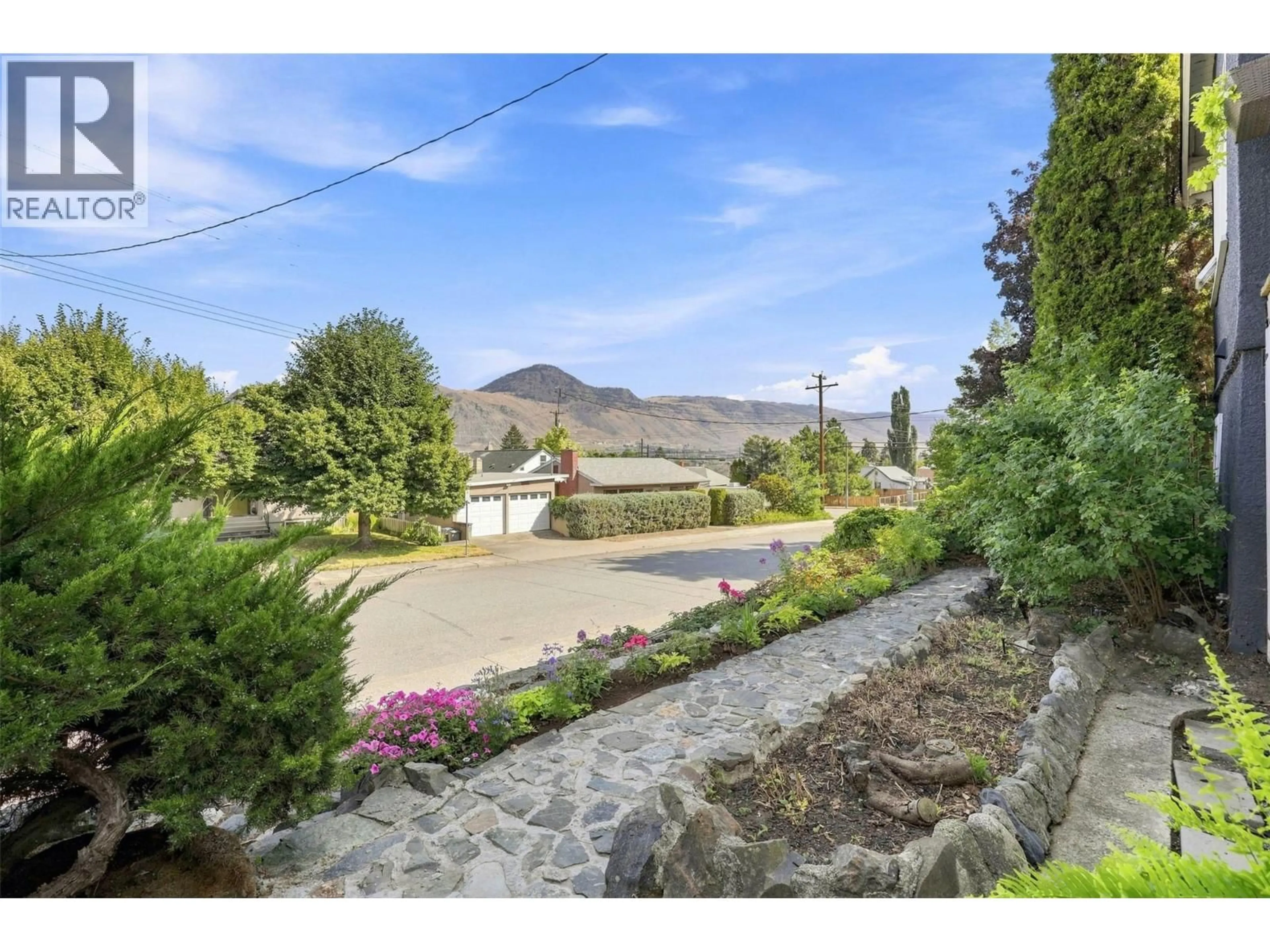 A pic from outside/outdoor area/front of a property/back of a property/a pic from drone, mountain view for 675 DOMINION STREET, Kamloops British Columbia V2C2X6