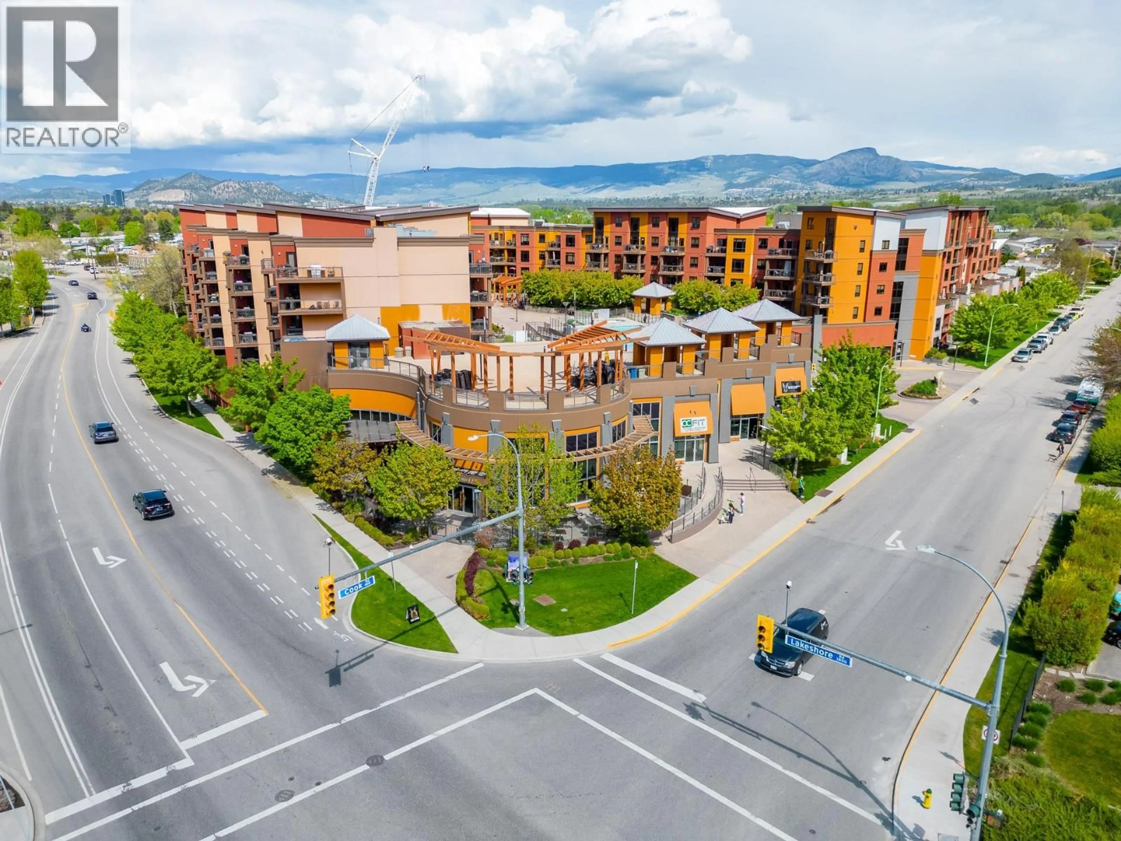 A pic from outside/outdoor area/front of a property/back of a property/a pic from drone, mountain view for 640 - 654 COOK ROAD, Kelowna British Columbia V1W3G7