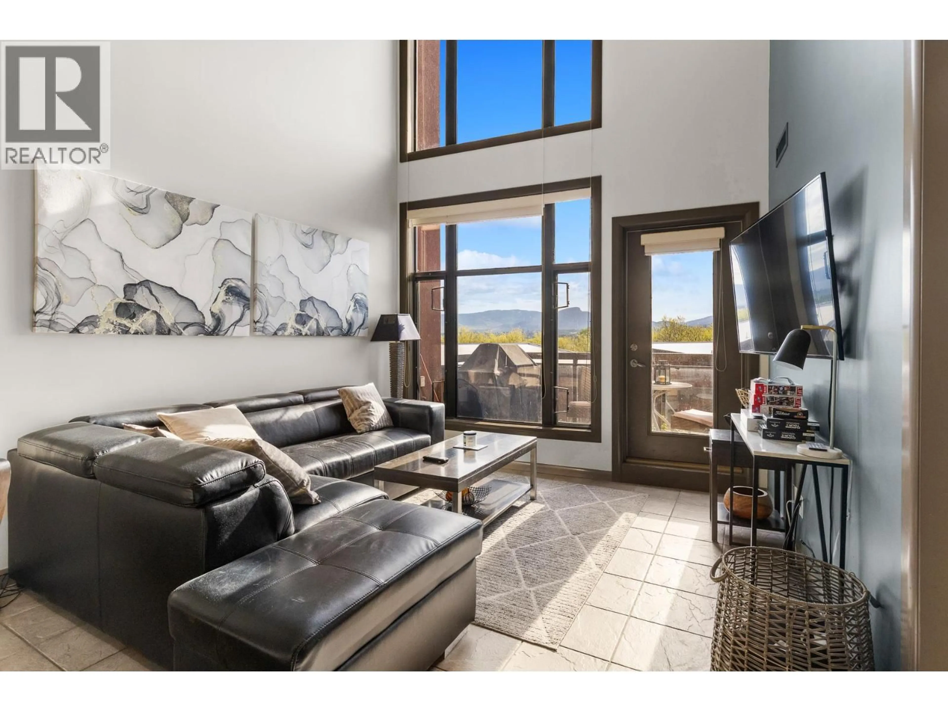 Living room with furniture, unknown for 640 - 654 COOK ROAD, Kelowna British Columbia V1W3G7