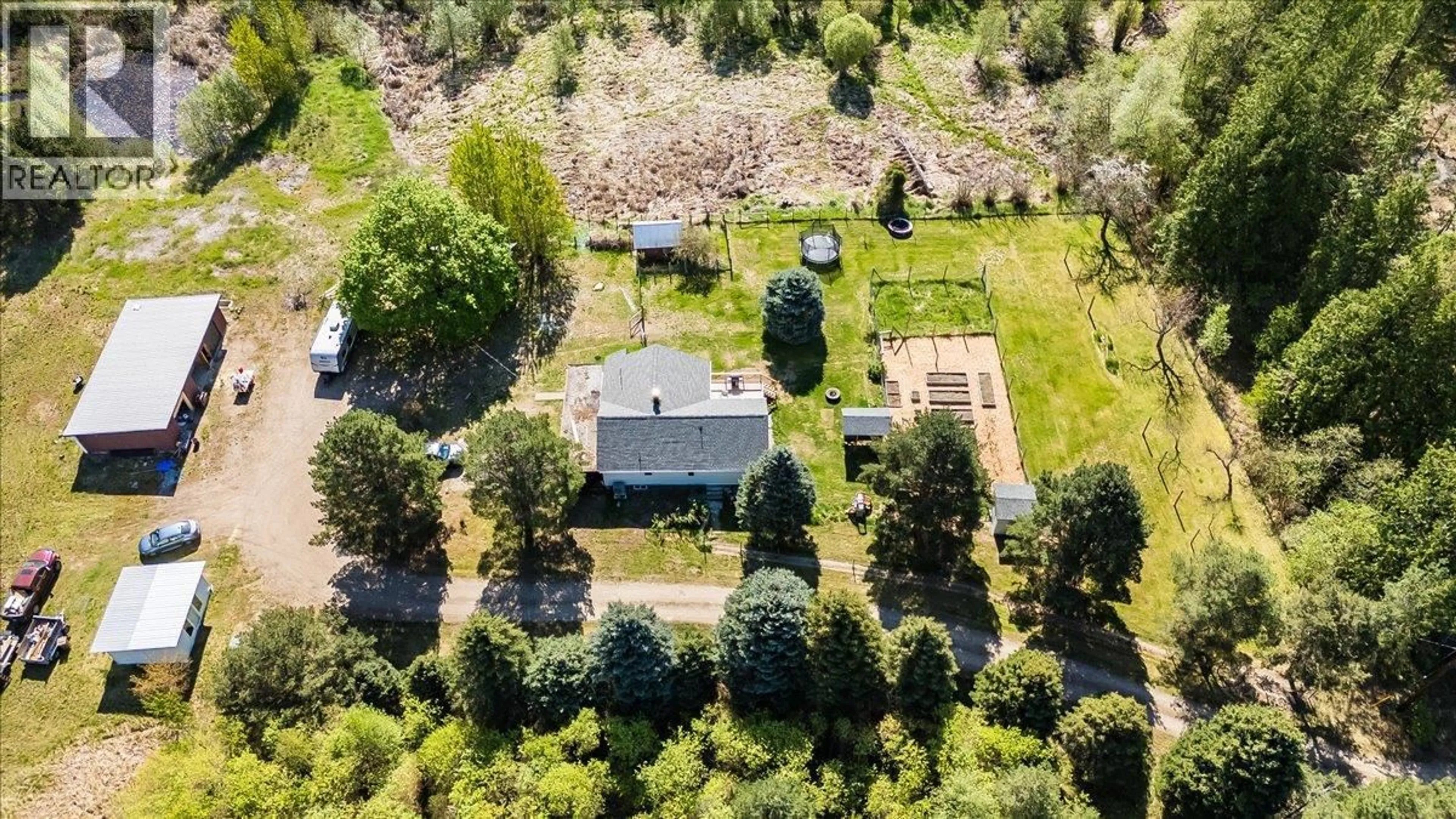 A pic from outside/outdoor area/front of a property/back of a property/a pic from drone, unknown for 3018 6 HIGHWAY, Slocan Park British Columbia V0G2E0
