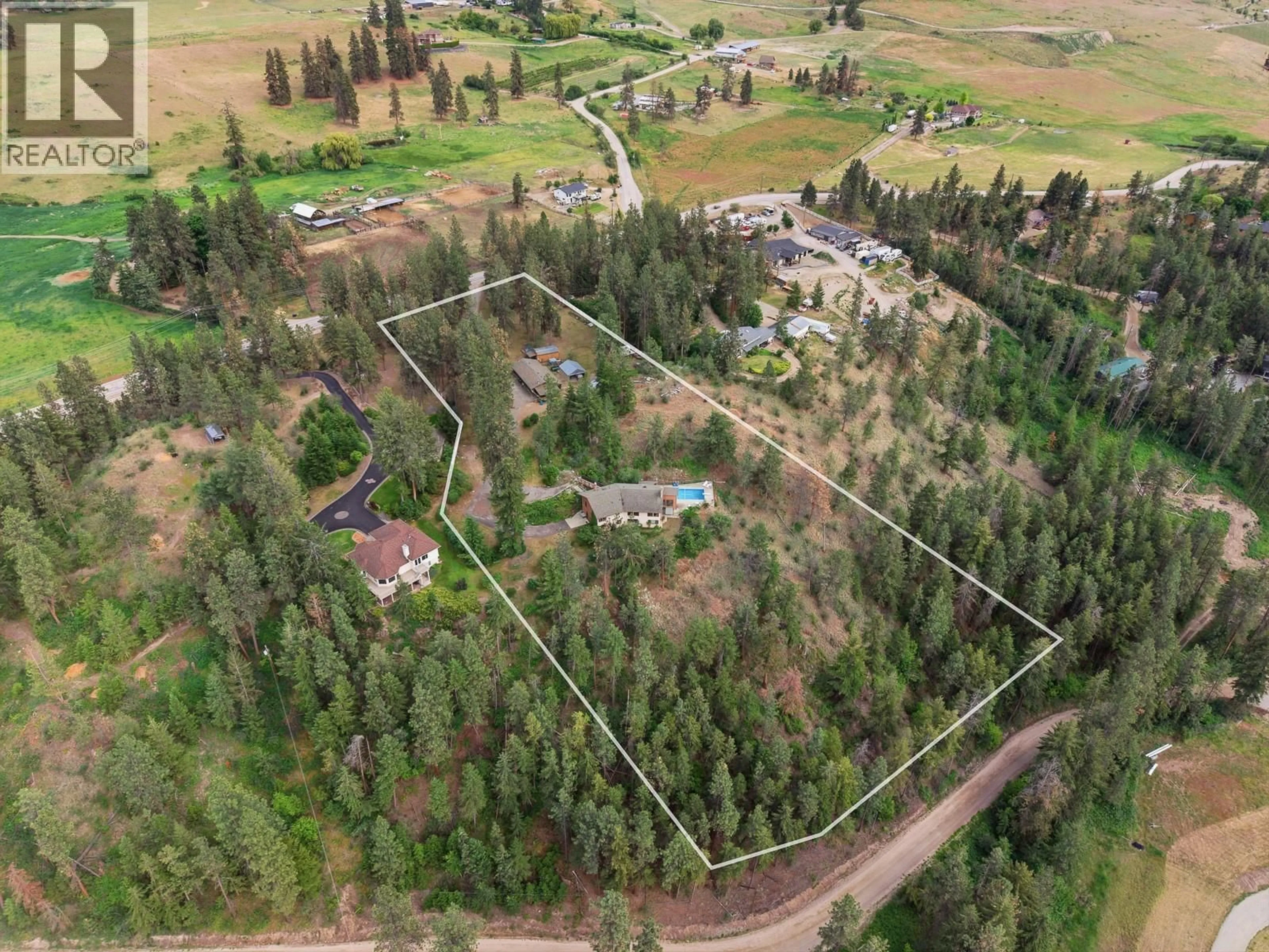 A pic from outside/outdoor area/front of a property/back of a property/a pic from drone, forest/trees view for 12610 OYAMA ROAD, Oyama British Columbia V4V2A4