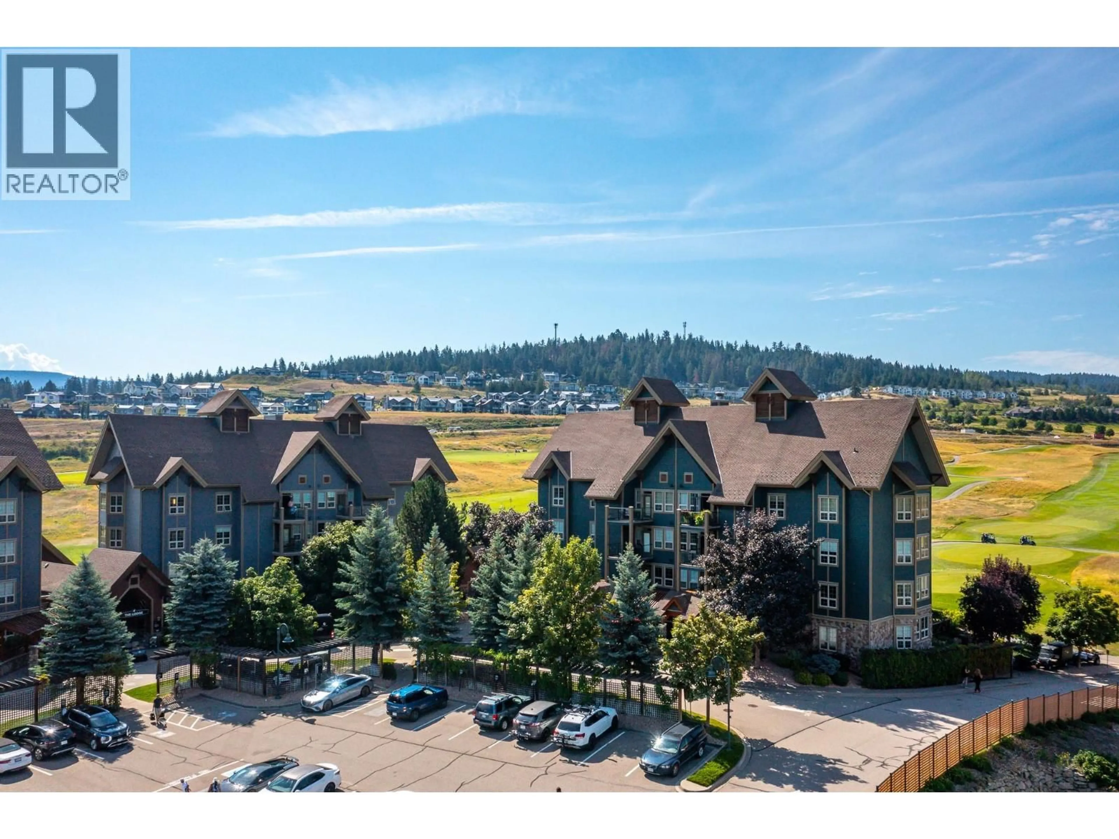 A pic from outside/outdoor area/front of a property/back of a property/a pic from drone, mountain view for 431 - 101 VILLAGE CENTRE COURT, Vernon British Columbia V1H1V8