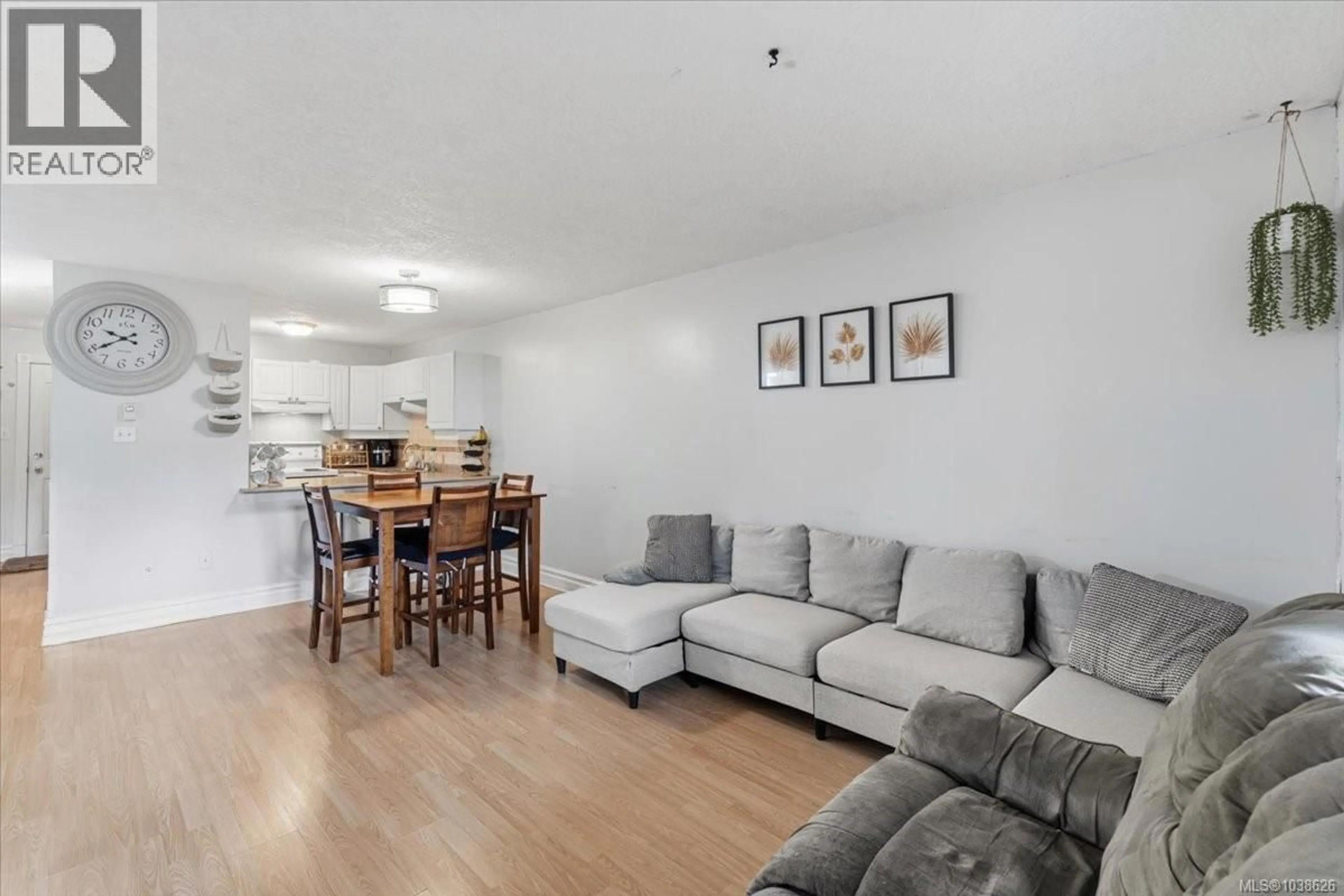 Living room with furniture, wood/laminate floor for 103 - 645 SELBY STREET, Nanaimo British Columbia V9R2S2