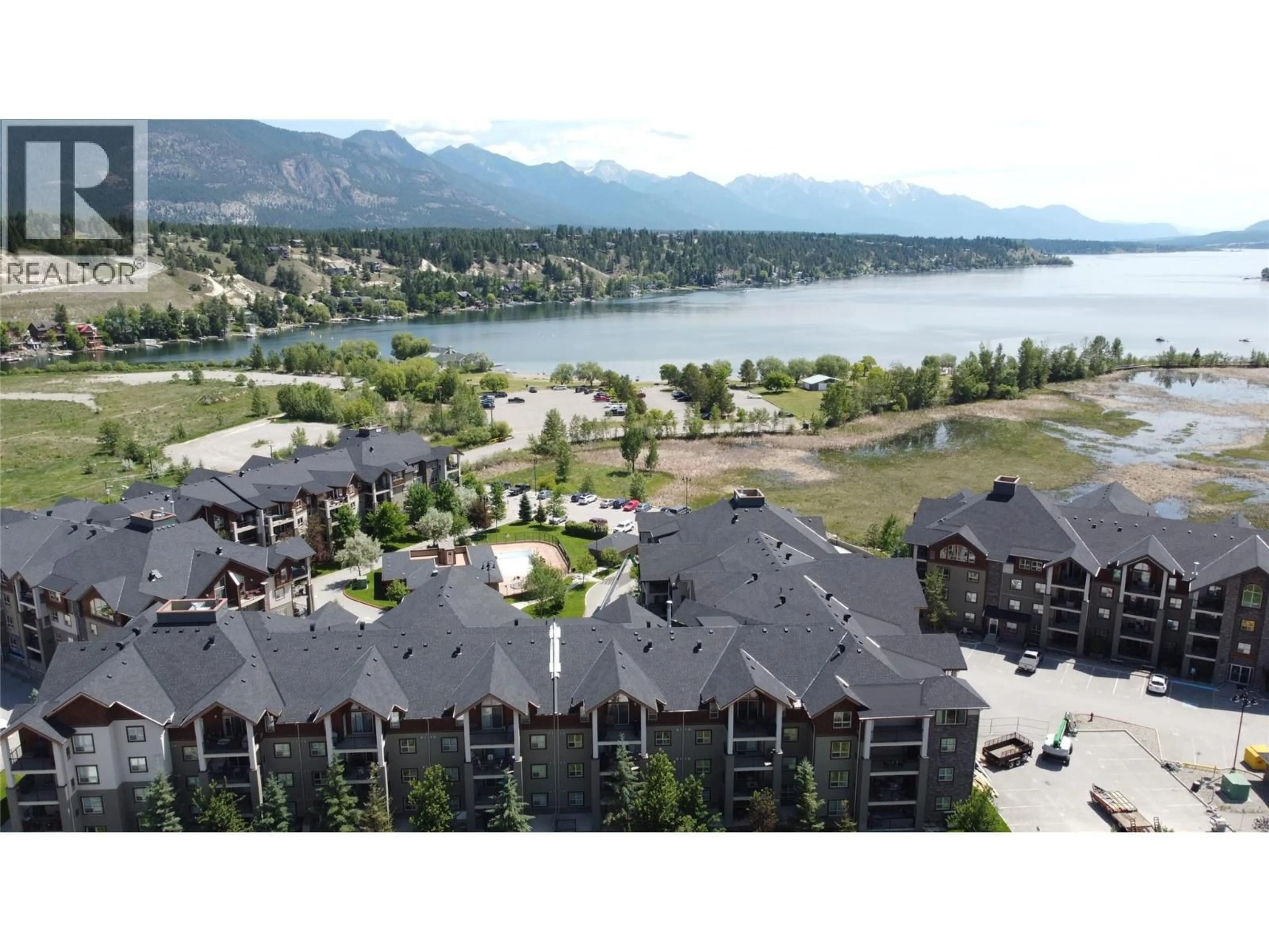 A pic from outside/outdoor area/front of a property/back of a property/a pic from drone, water/lake/river/ocean view for 3302 - 205 THIRD AVENUE, Invermere British Columbia V0A1K4