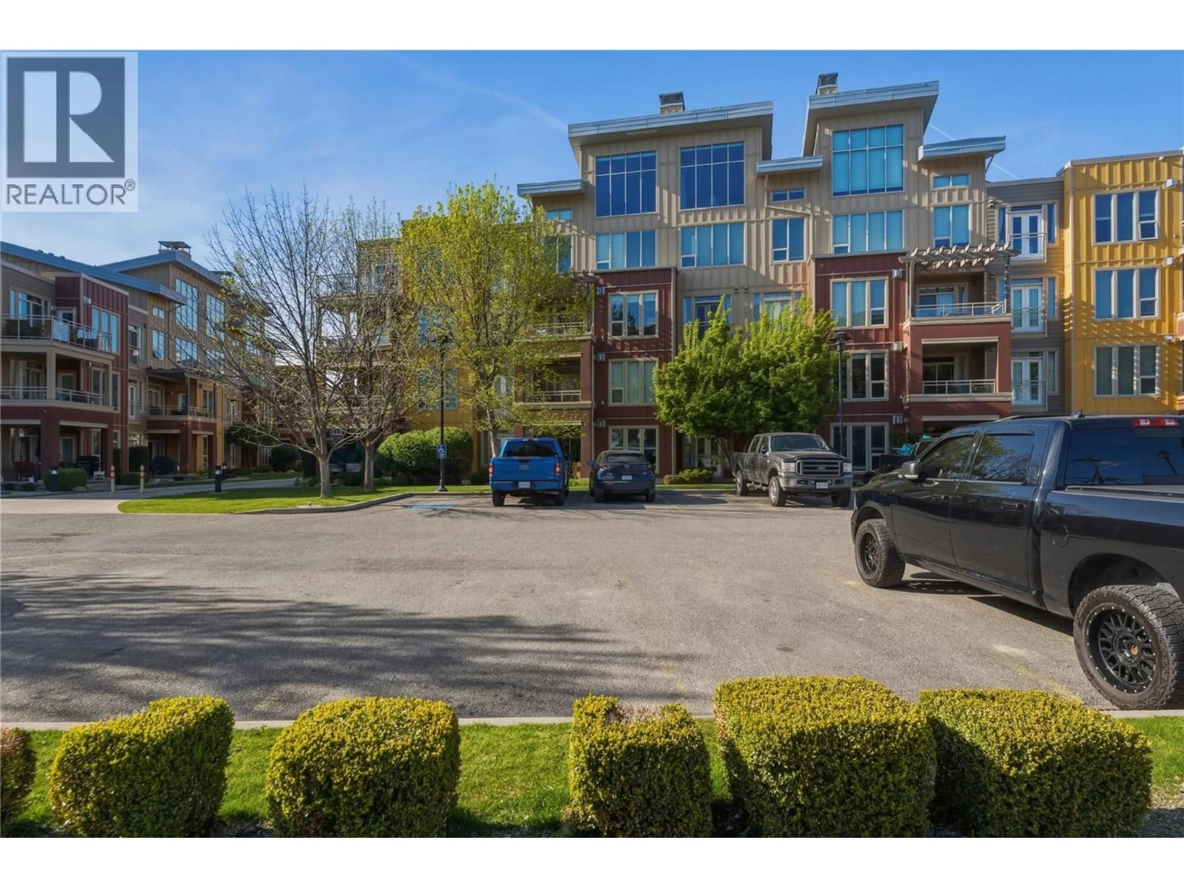 A pic from outside/outdoor area/front of a property/back of a property/a pic from drone, street for 2303 - 7343 OKANAGAN LANDING ROAD, Vernon British Columbia V1H2J6