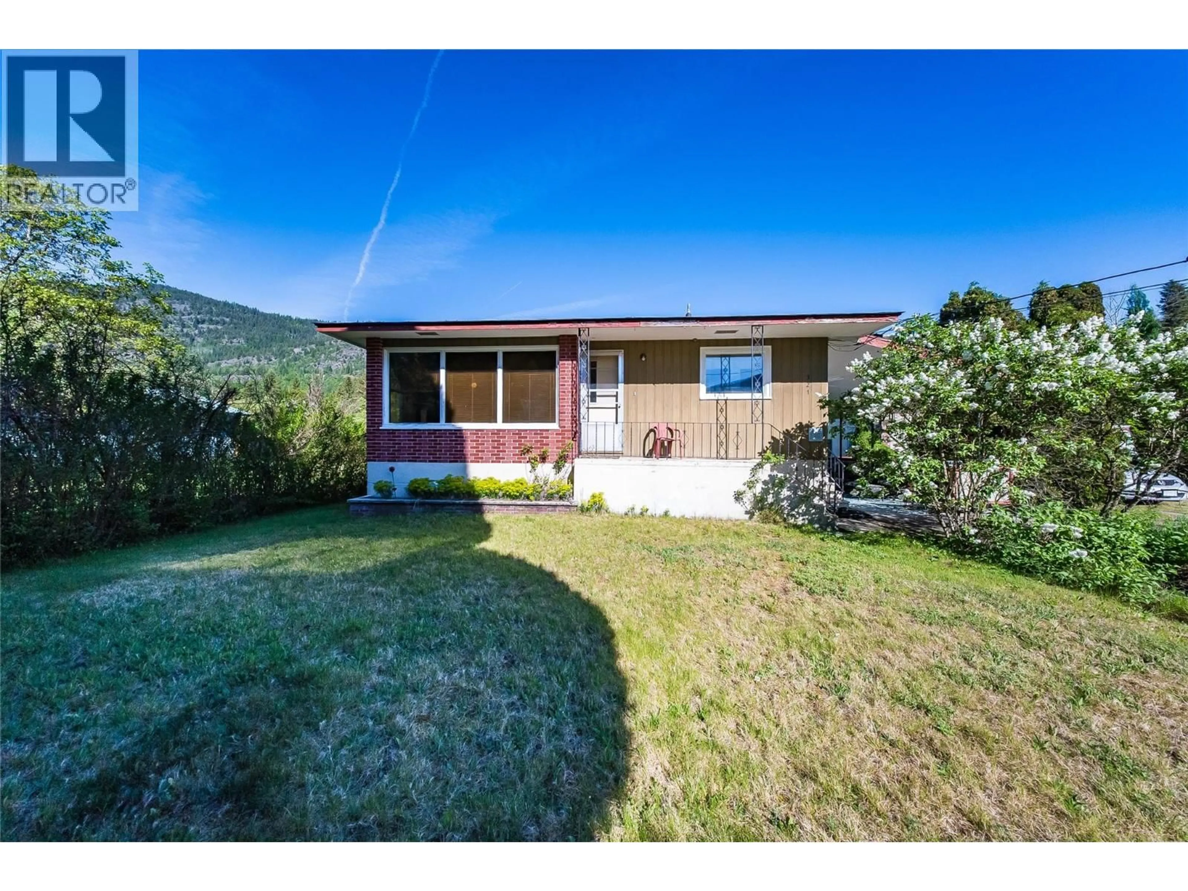 A pic from outside/outdoor area/front of a property/back of a property/a pic from drone, street for 321 12TH AVENUE, Genelle British Columbia V0G1G0