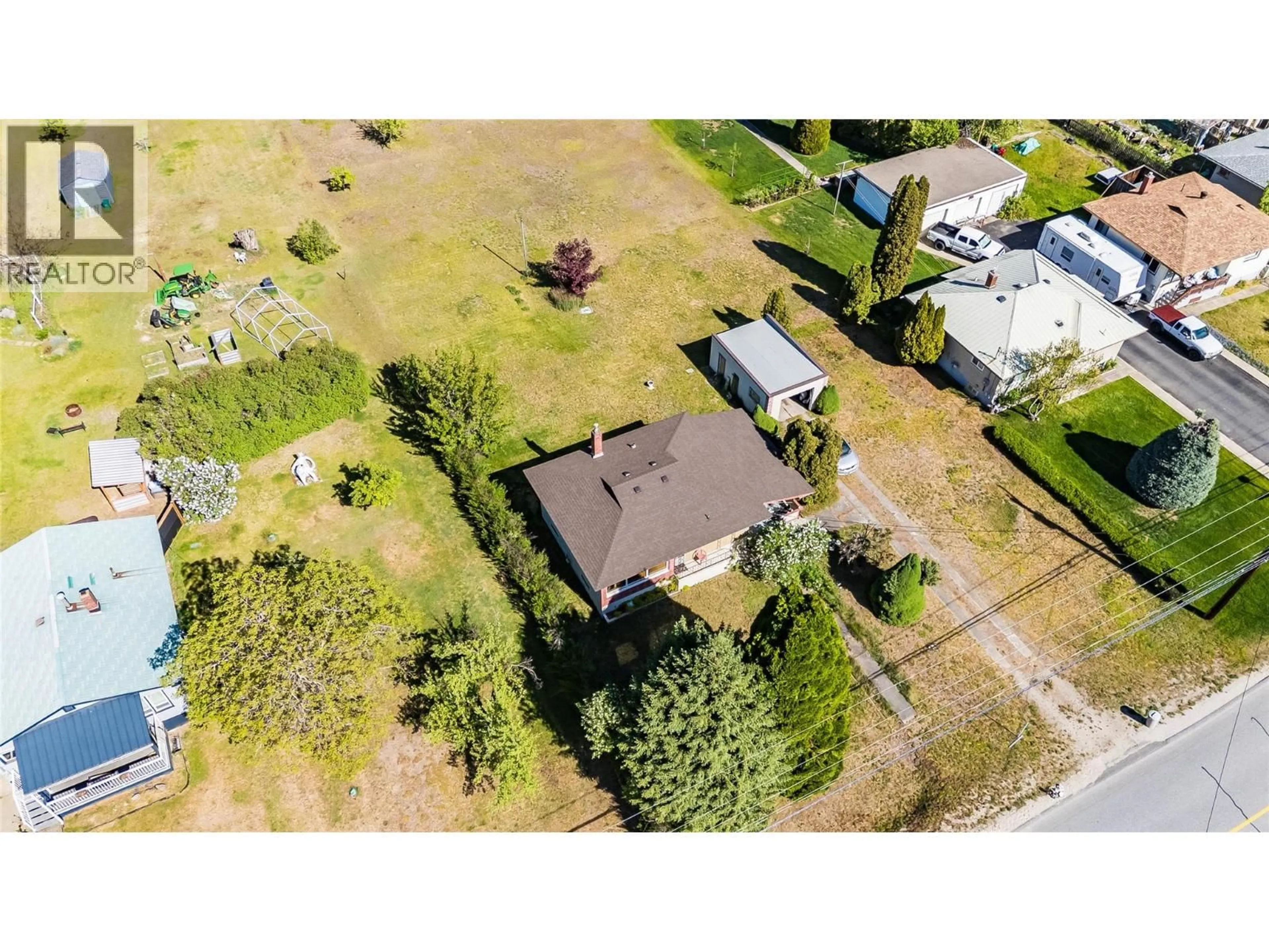 A pic from outside/outdoor area/front of a property/back of a property/a pic from drone, street for 321 12TH AVENUE, Genelle British Columbia V0G1G0