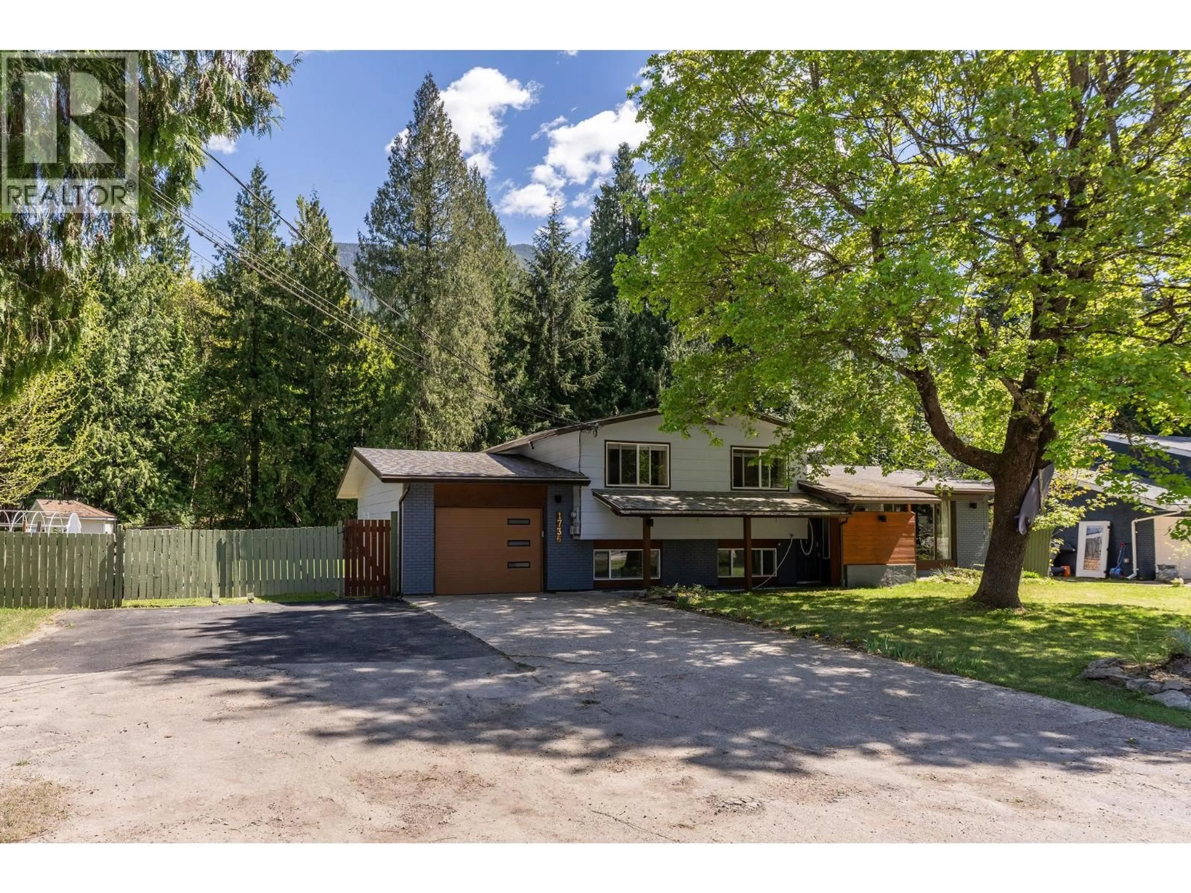 A pic from outside/outdoor area/front of a property/back of a property/a pic from drone, forest/trees view for 1736 HAY ROAD, Revelstoke British Columbia V0E2S1