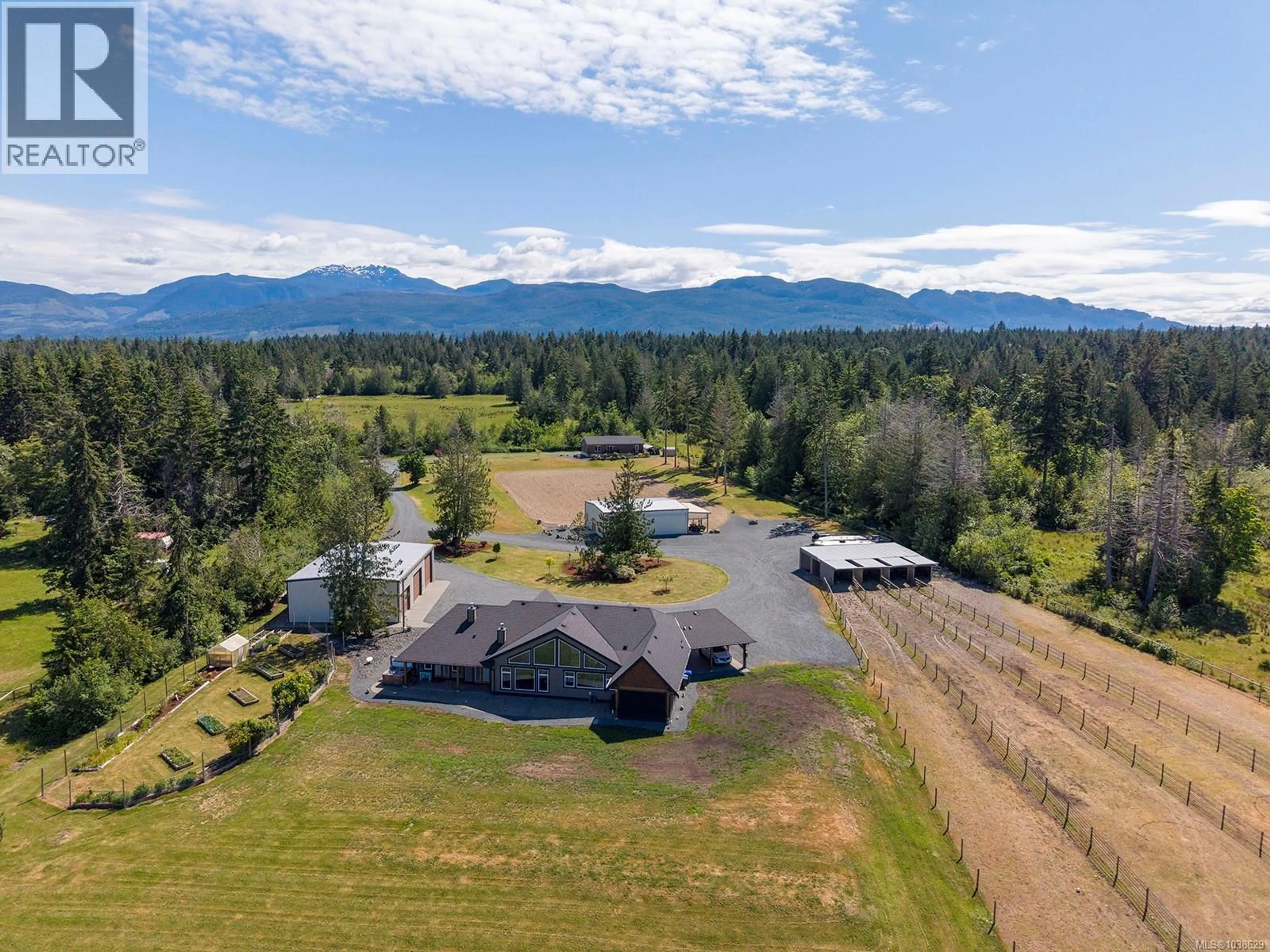 A pic from outside/outdoor area/front of a property/back of a property/a pic from drone, mountain view for 416 GROVEHILL ROAD, Qualicum Beach British Columbia V9K2A3