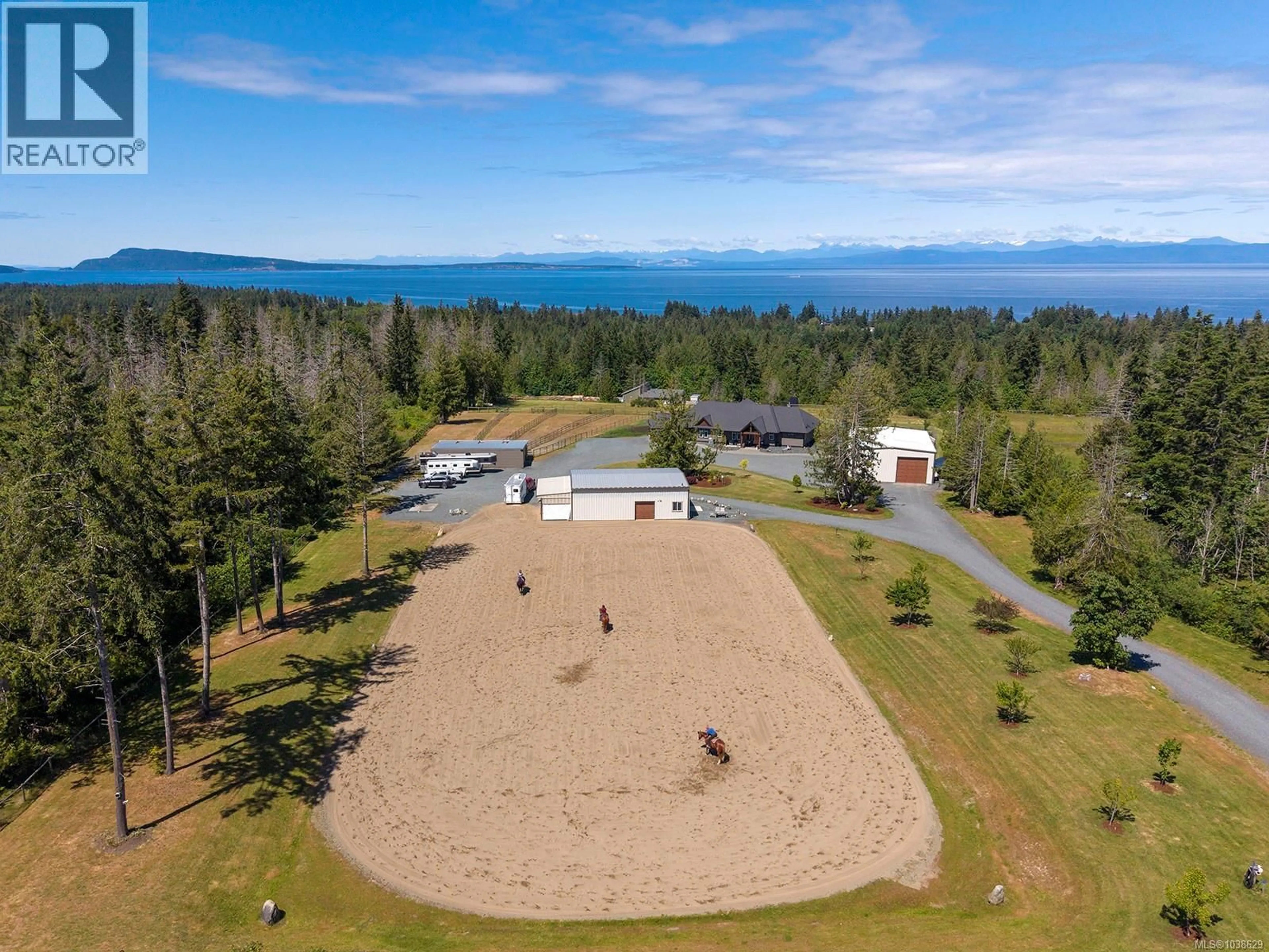 A pic from outside/outdoor area/front of a property/back of a property/a pic from drone, water/lake/river/ocean view for 416 GROVEHILL ROAD, Qualicum Beach British Columbia V9K2A3