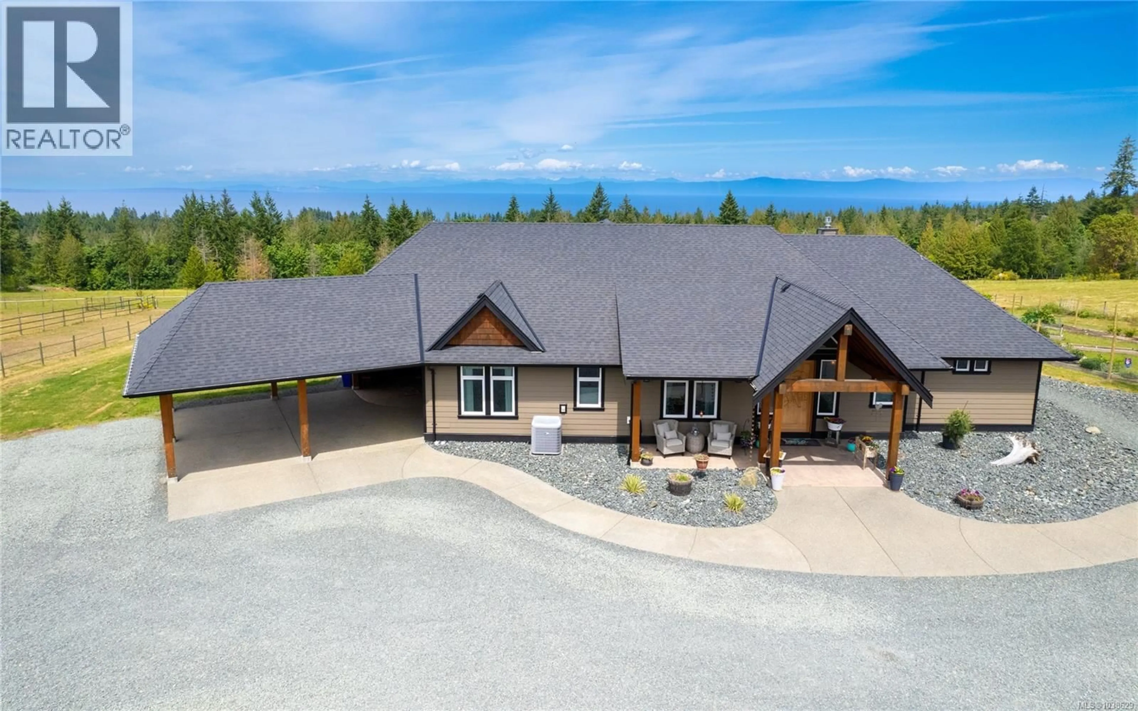 A pic from outside/outdoor area/front of a property/back of a property/a pic from drone, mountain view for 416 GROVEHILL ROAD, Qualicum Beach British Columbia V9K2A3