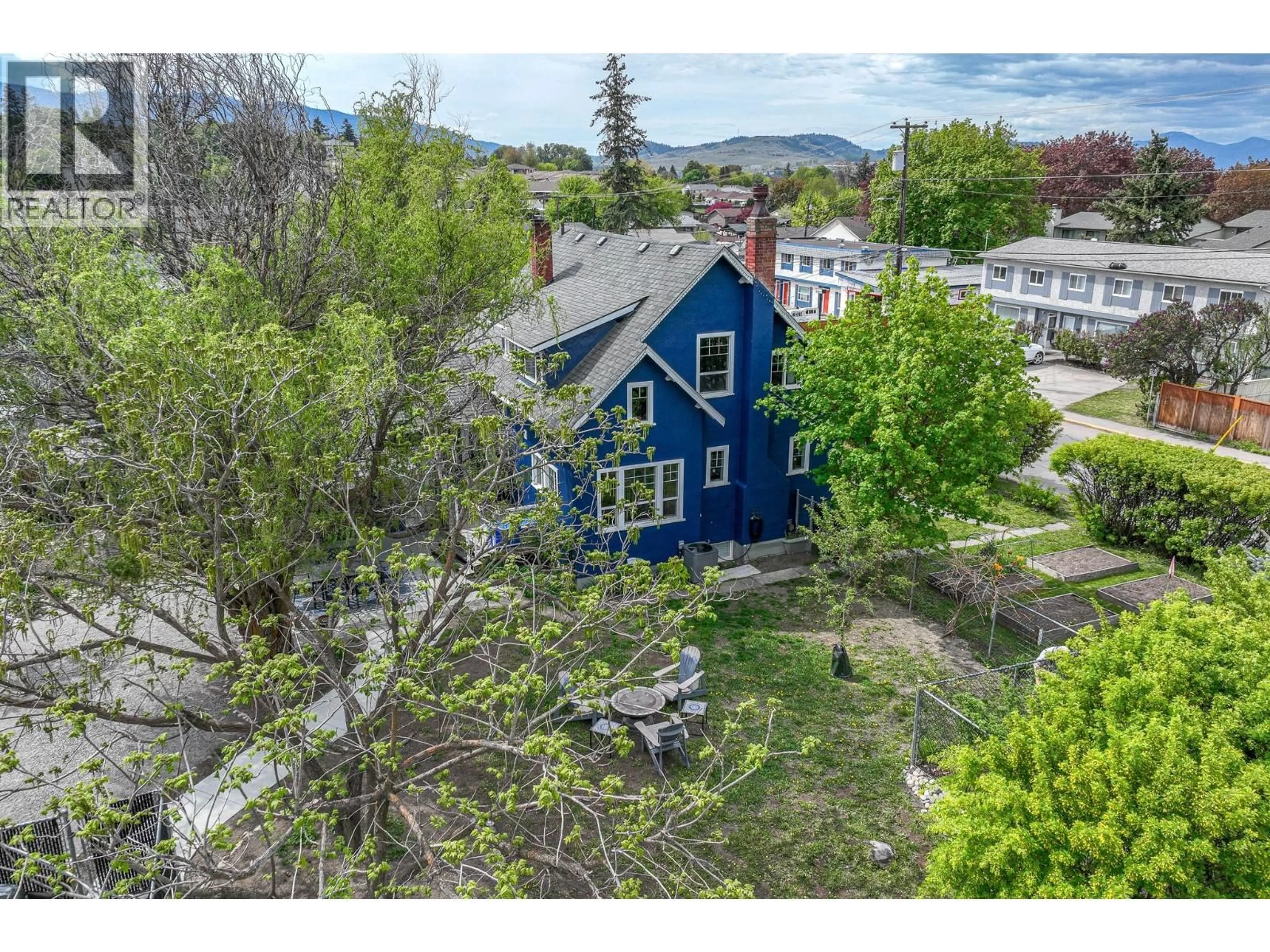 A pic from outside/outdoor area/front of a property/back of a property/a pic from drone, street for 4215 20TH STREET, Vernon British Columbia V1T4E2