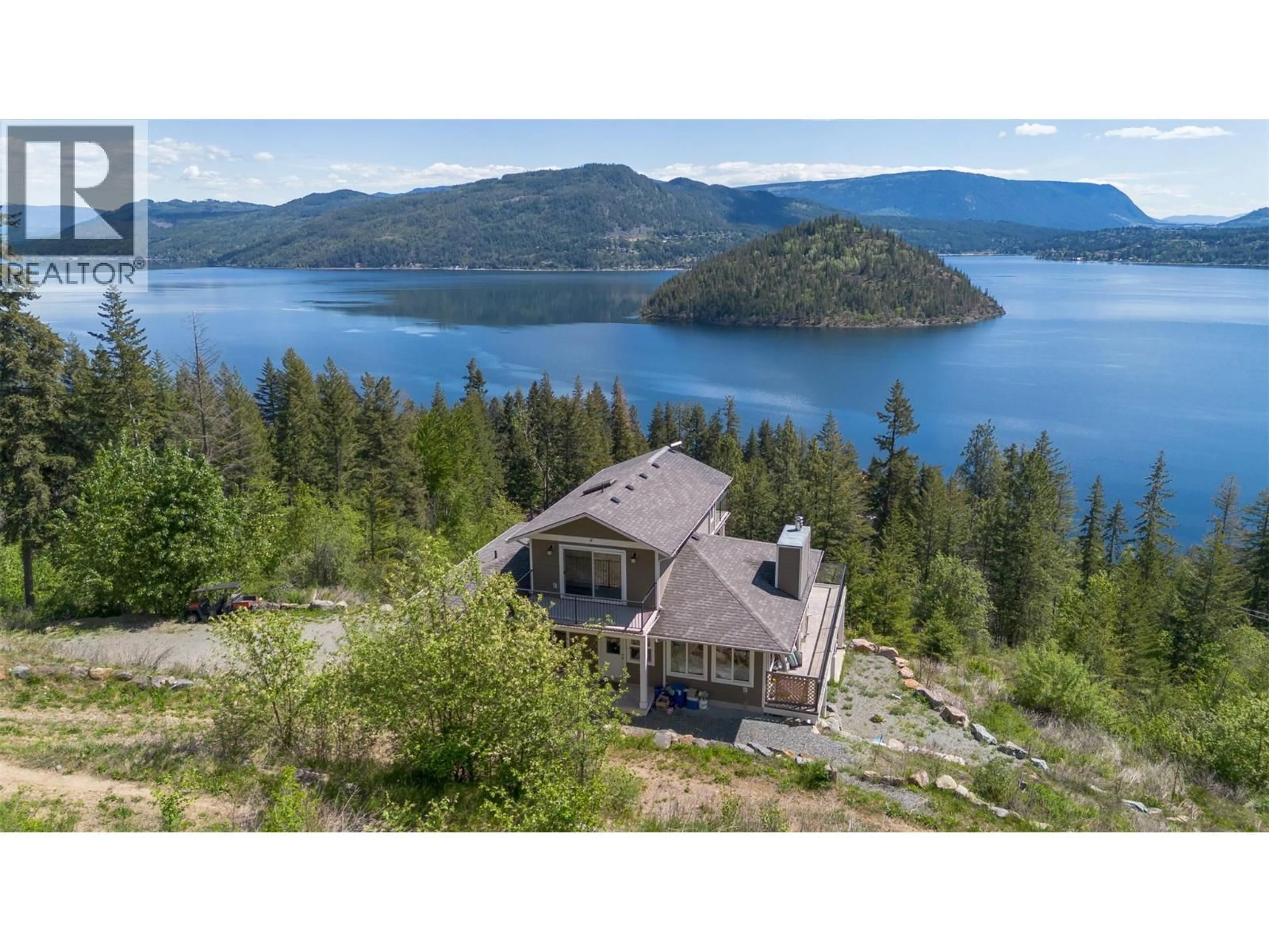 A pic from outside/outdoor area/front of a property/back of a property/a pic from drone, water/lake/river/ocean view for 4317 LEOPOLD ROAD, Scotch Creek British Columbia V0E1M5