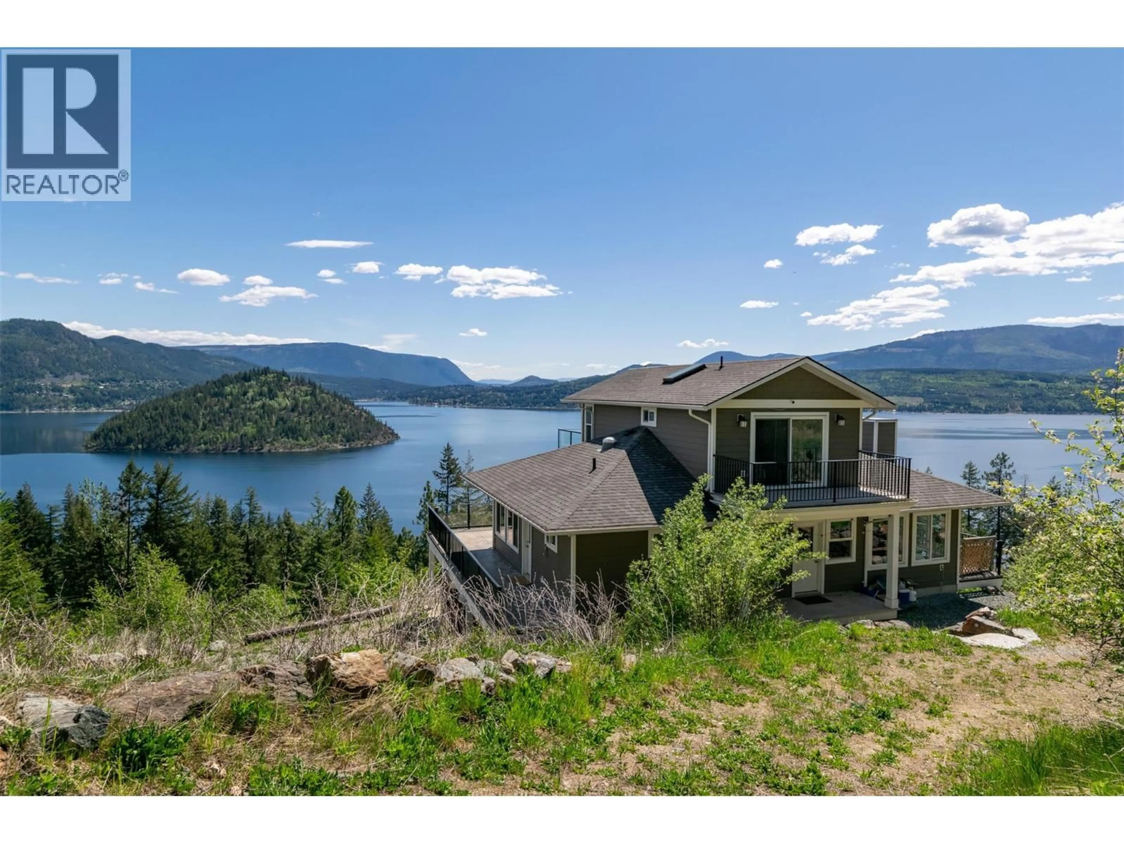 A pic from outside/outdoor area/front of a property/back of a property/a pic from drone, water/lake/river/ocean view for 4317 LEOPOLD ROAD, Scotch Creek British Columbia V0E1M5