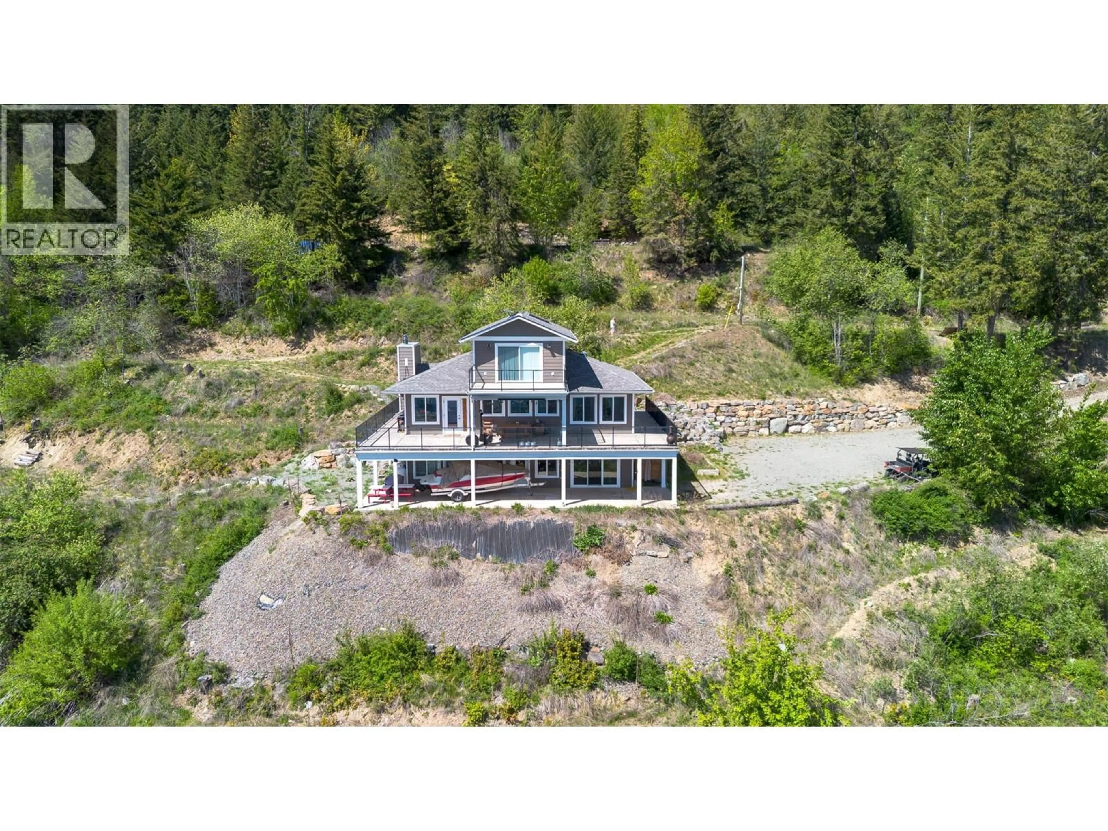 A pic from outside/outdoor area/front of a property/back of a property/a pic from drone, water/lake/river/ocean view for 4317 LEOPOLD ROAD, Scotch Creek British Columbia V0E1M5