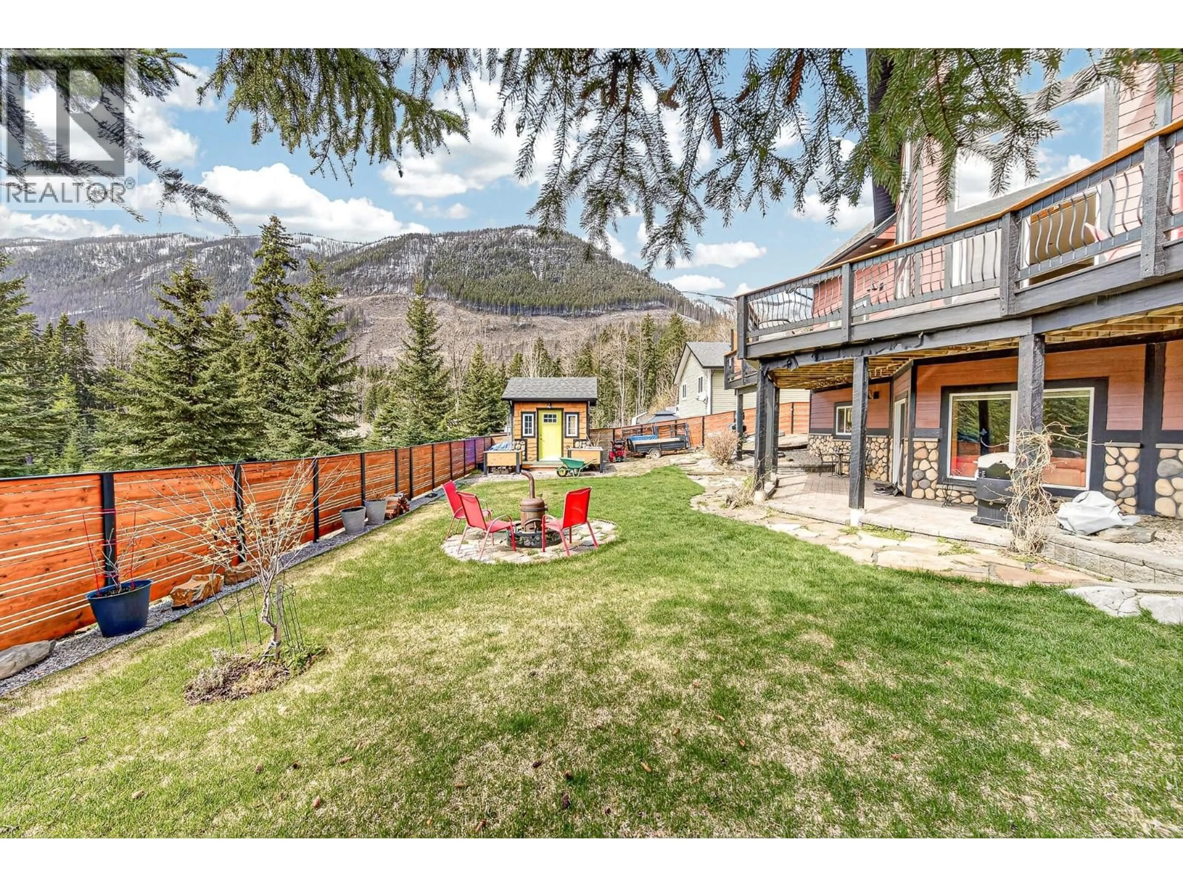 A pic from outside/outdoor area/front of a property/back of a property/a pic from drone, mountain view for 1220 PONDEROSA DRIVE, Sparwood British Columbia V0B2G2