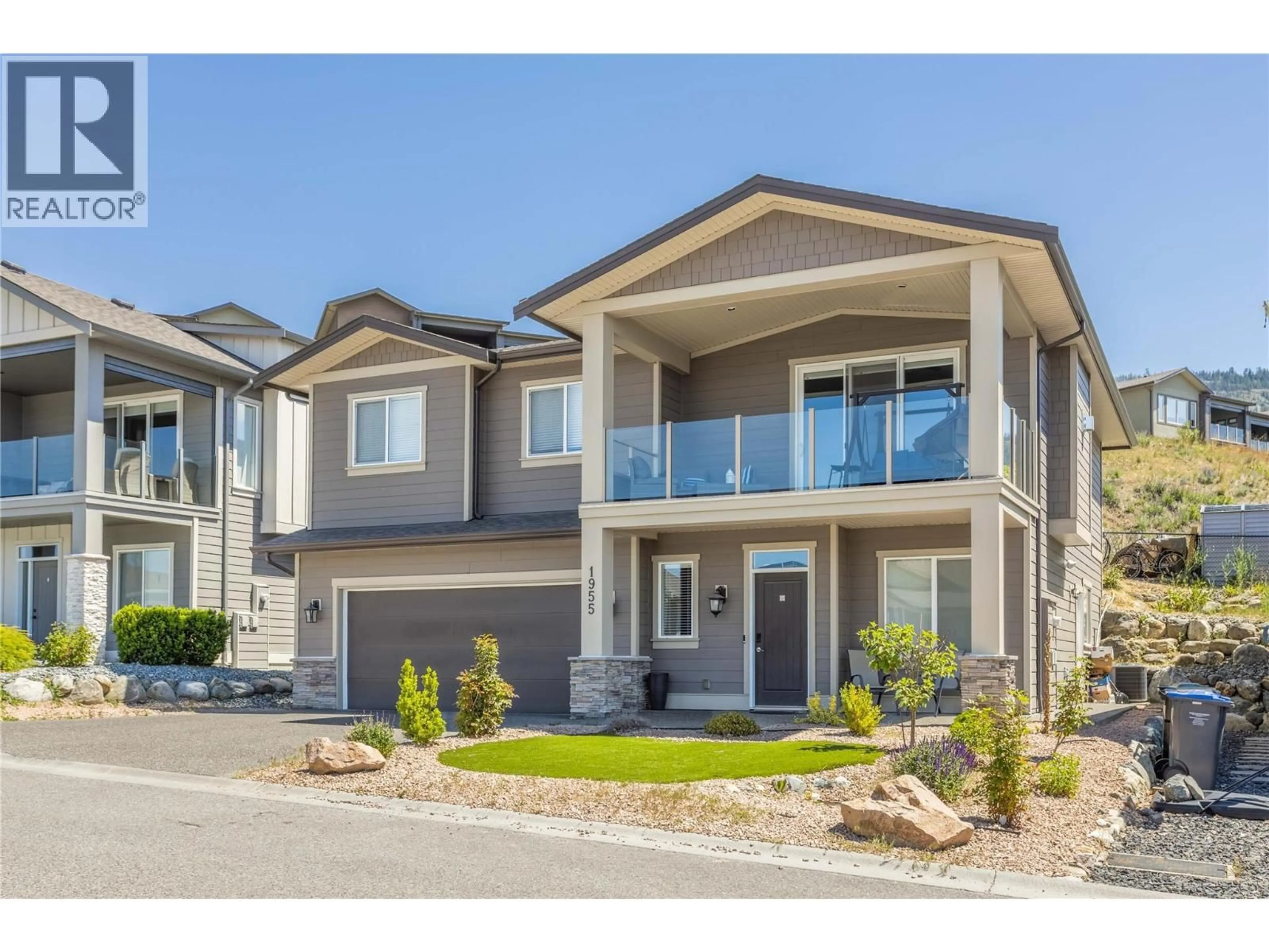Home with vinyl exterior material, street for 1955 FOXTAIL TERRACE, Kelowna British Columbia V1P1T9
