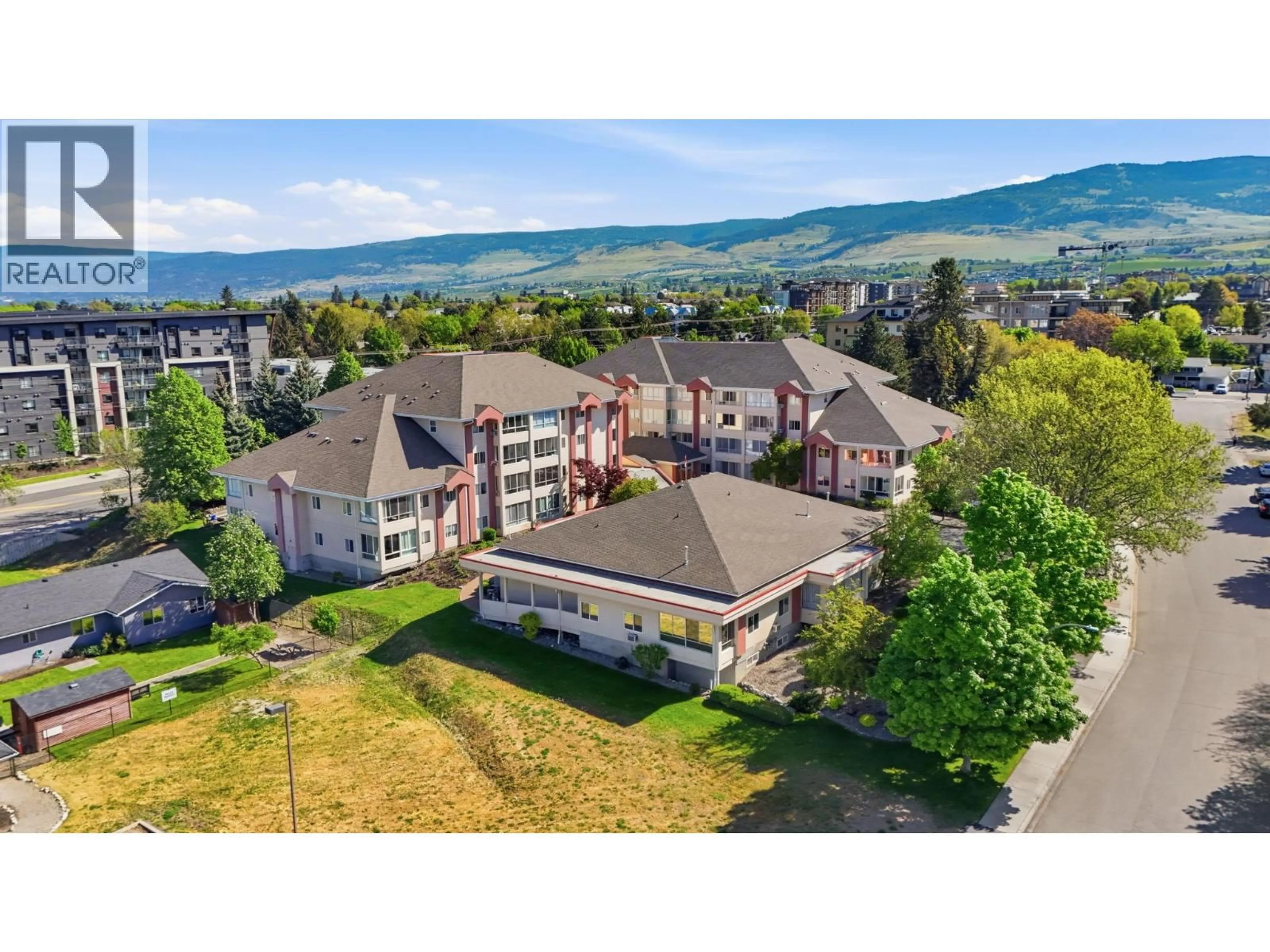 A pic from outside/outdoor area/front of a property/back of a property/a pic from drone, mountain view for 118 - 920 SASKATOON ROAD, Kelowna British Columbia V1X7P8