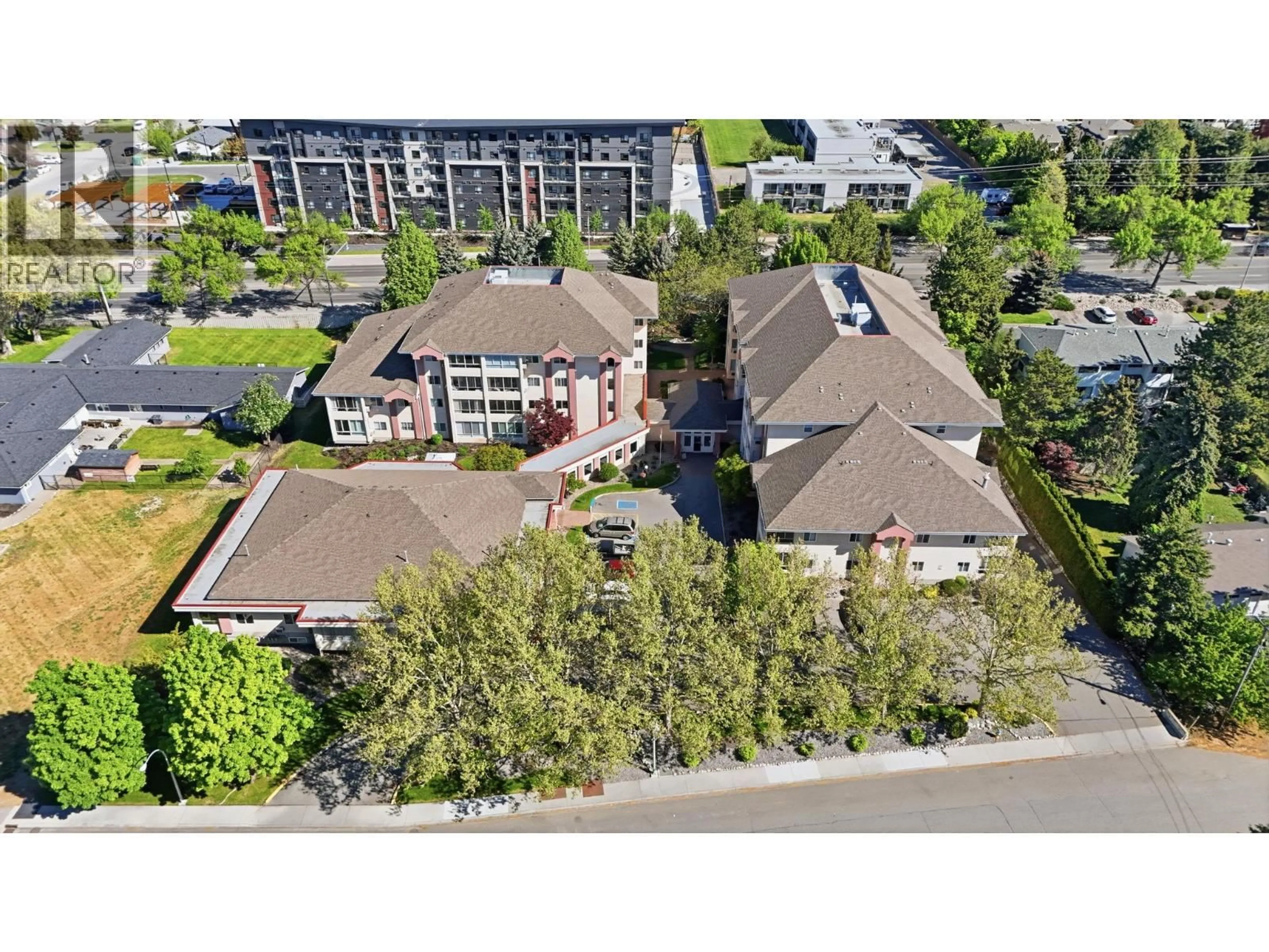 A pic from outside/outdoor area/front of a property/back of a property/a pic from drone, unknown for 118 - 920 SASKATOON ROAD, Kelowna British Columbia V1X7P8