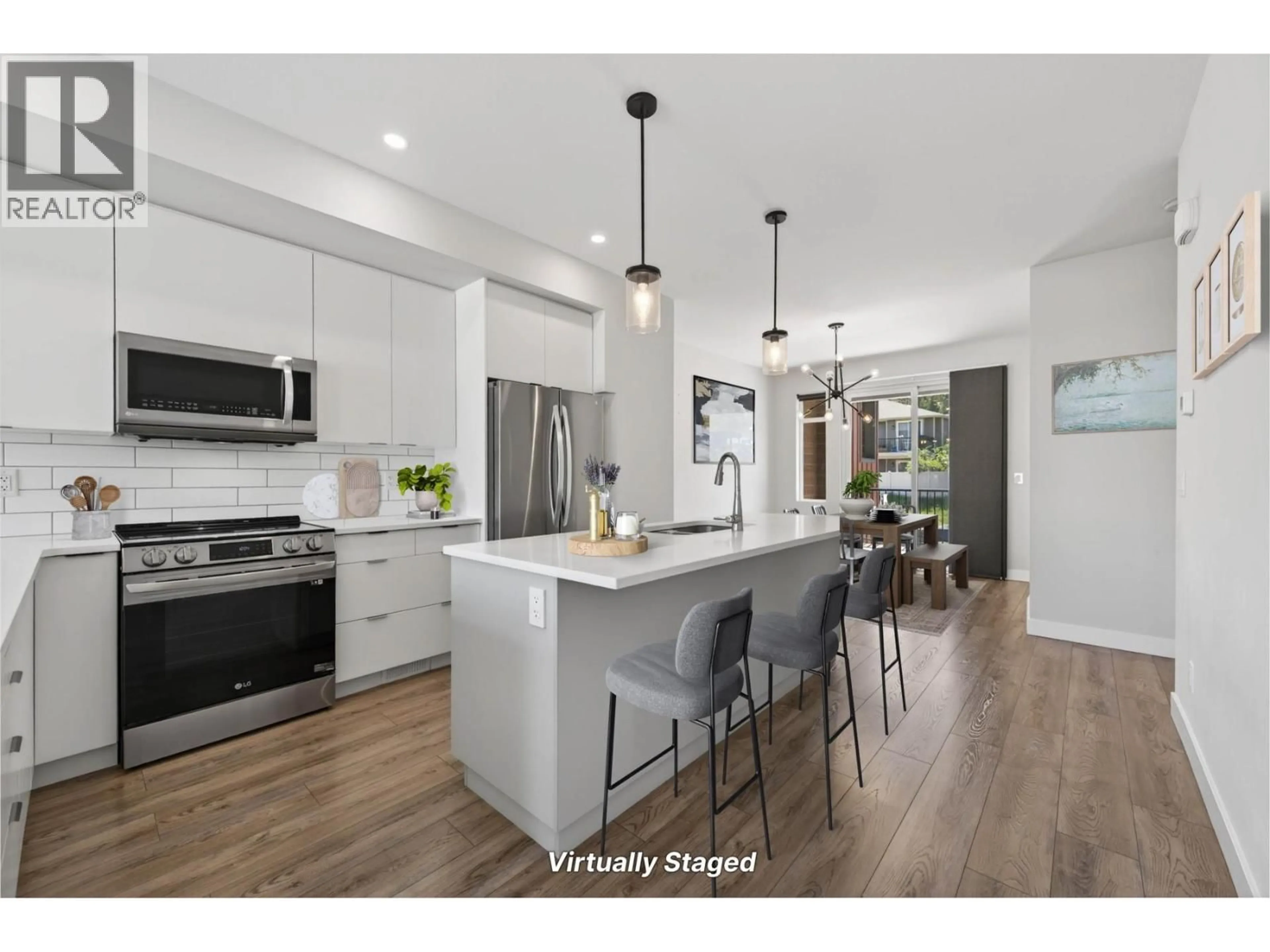 Open concept kitchen, wood/laminate floor for 130 - 1901 QU'APPELLE BOULEVARD, Kamloops British Columbia V2E0C9