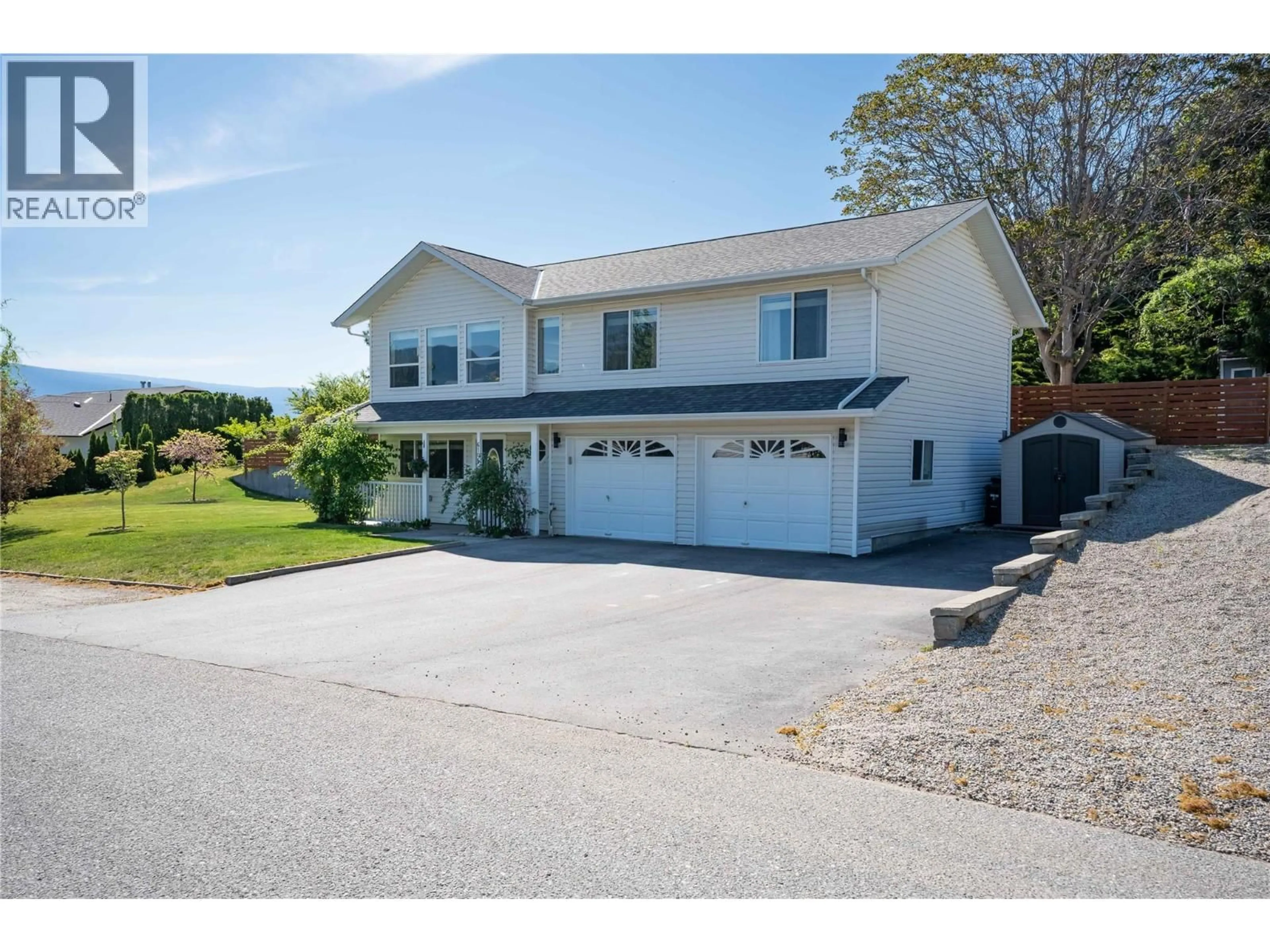 Home with vinyl exterior material, street for 6106 ORR PLACE, Summerland British Columbia V0H1Z7