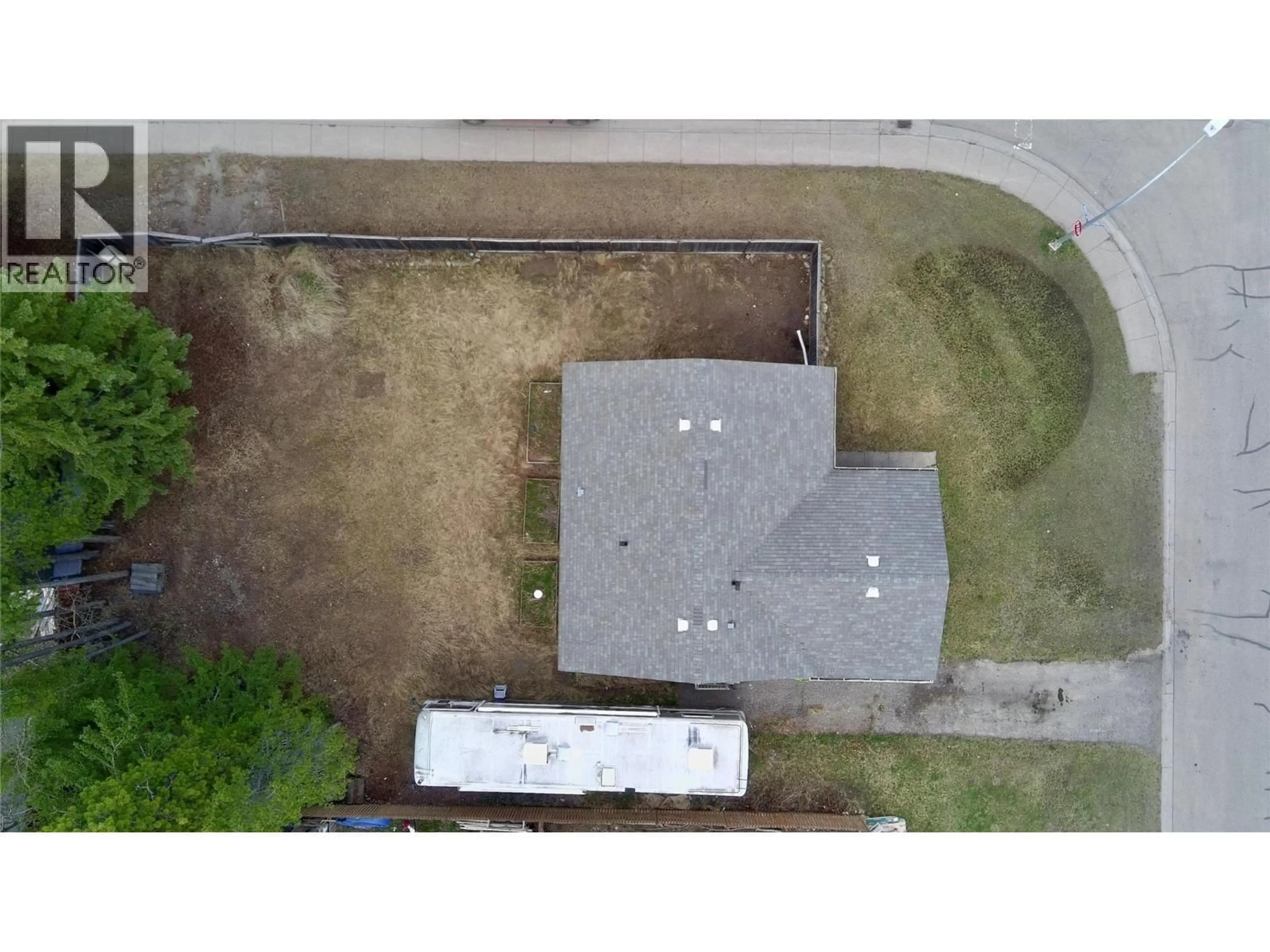 A pic from outside/outdoor area/front of a property/back of a property/a pic from drone, street for 140 SPRUCE AVENUE, Tumbler Ridge British Columbia V0C2W0