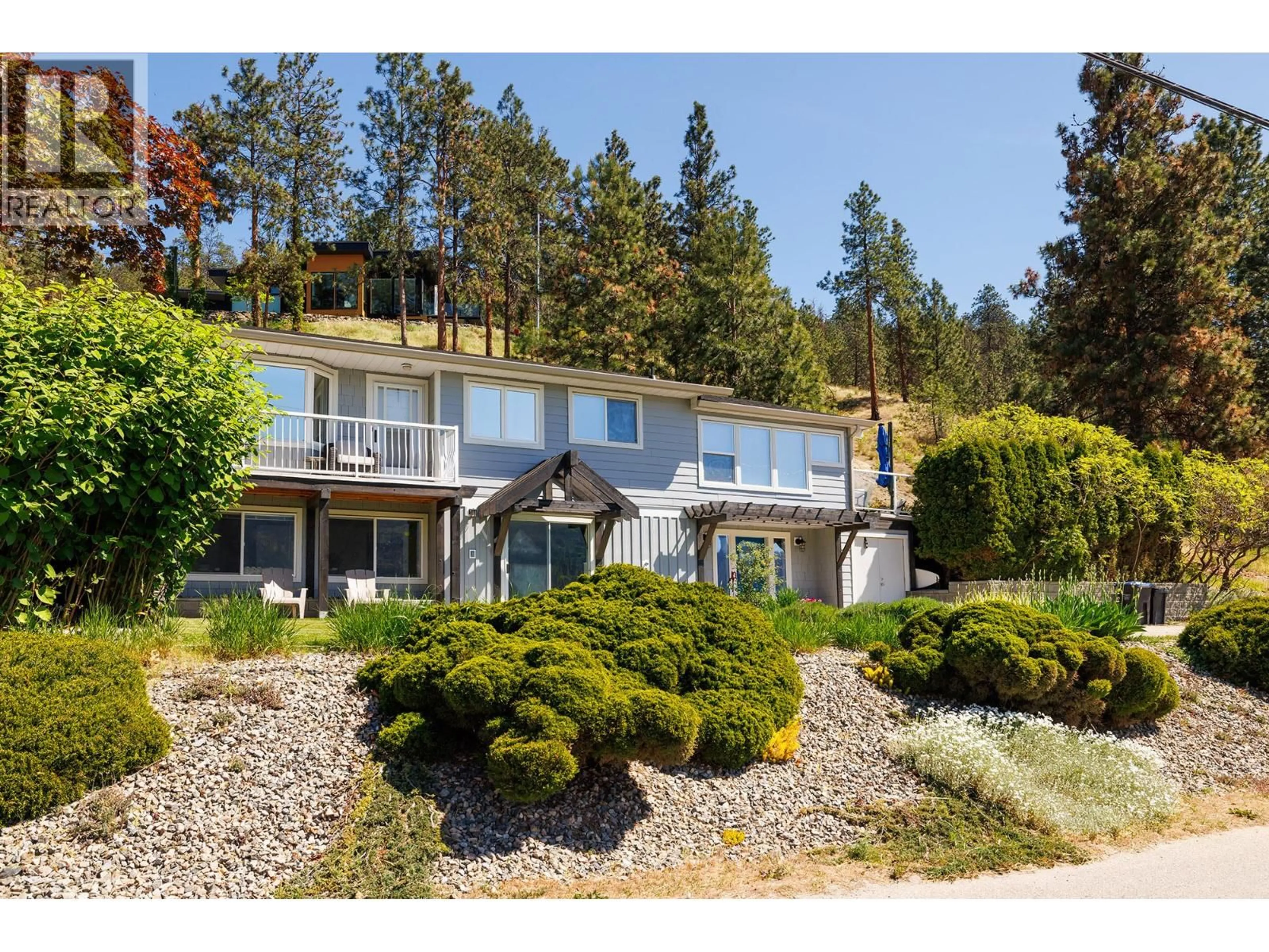 A pic from outside/outdoor area/front of a property/back of a property/a pic from drone, water/lake/river/ocean view for 10837 OKANAGAN CENTRE ROAD WEST, Lake Country British Columbia V4V2H8